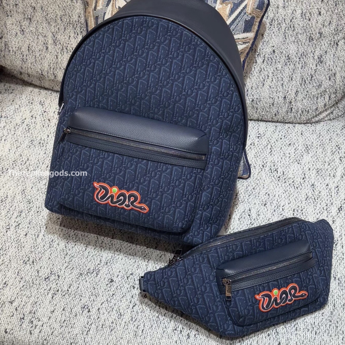 AND KAWS RIDER 2.0 ZIPPED BACKPACK NAVY BLUE GRAINED CALFSKIN AND OBLIQUE JACQUARD