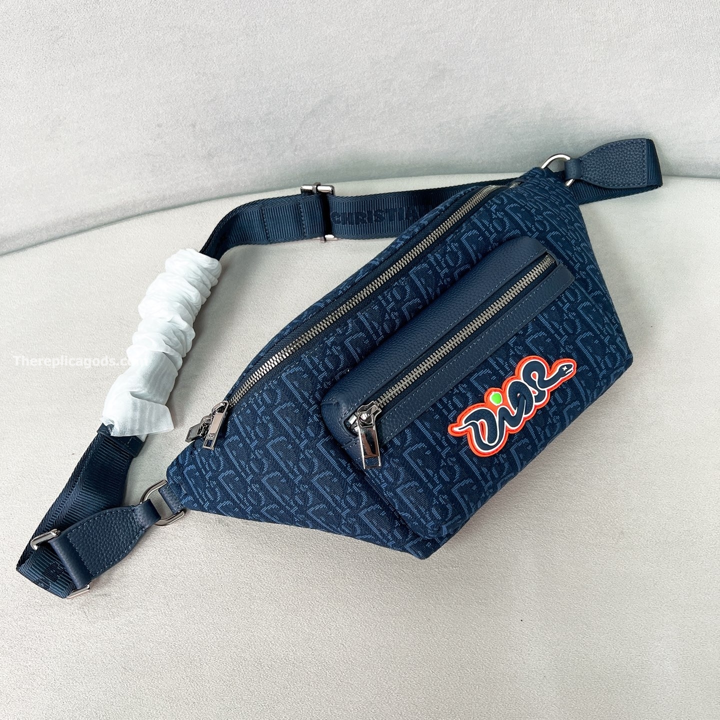 AND KAWS RIDER 2.0 BELT BAG NAVY BLUE OBLIQUE JACQUARD AND GRAINED CALFSKIN