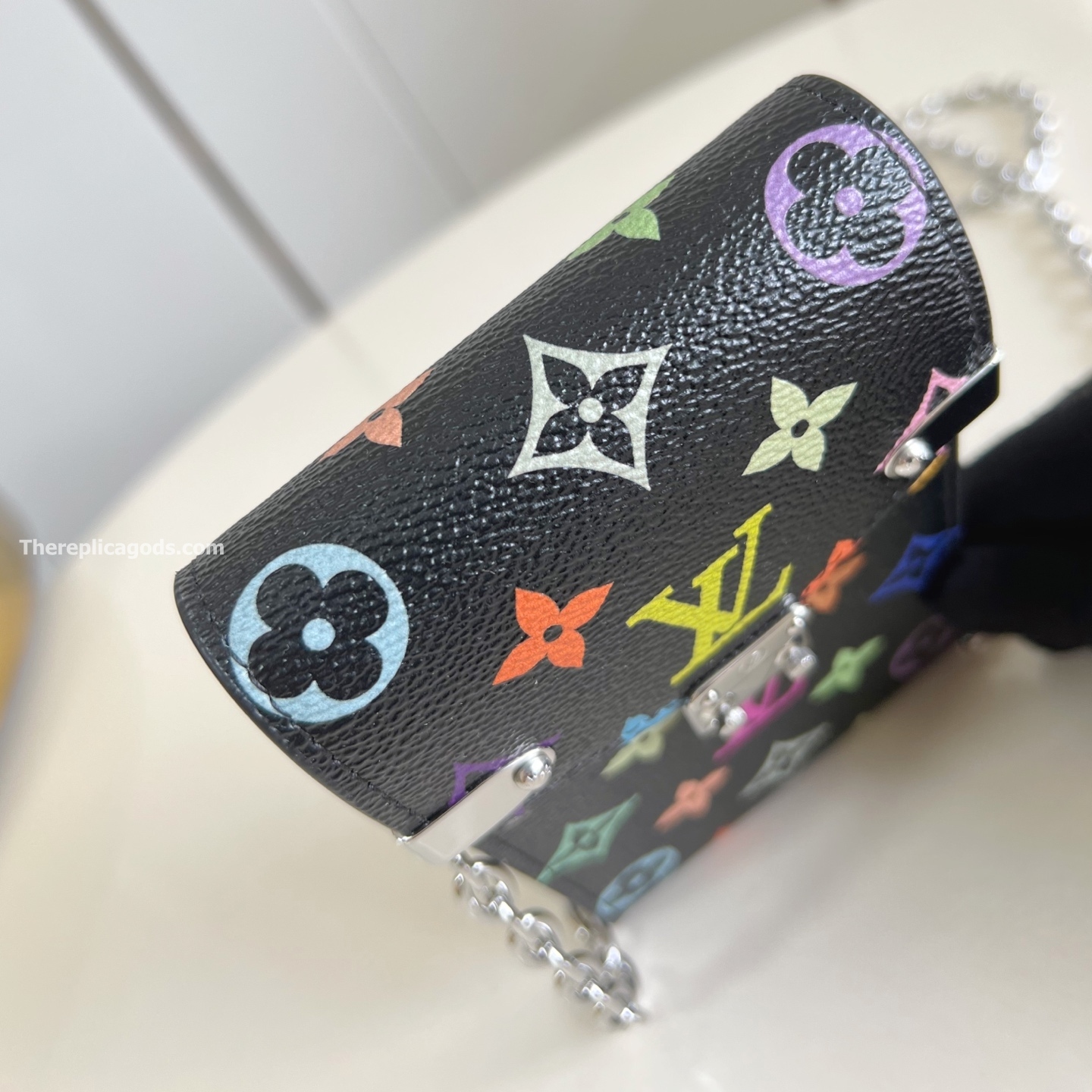 x TM PHONE POUCH METIS MULTICOLORED M14098