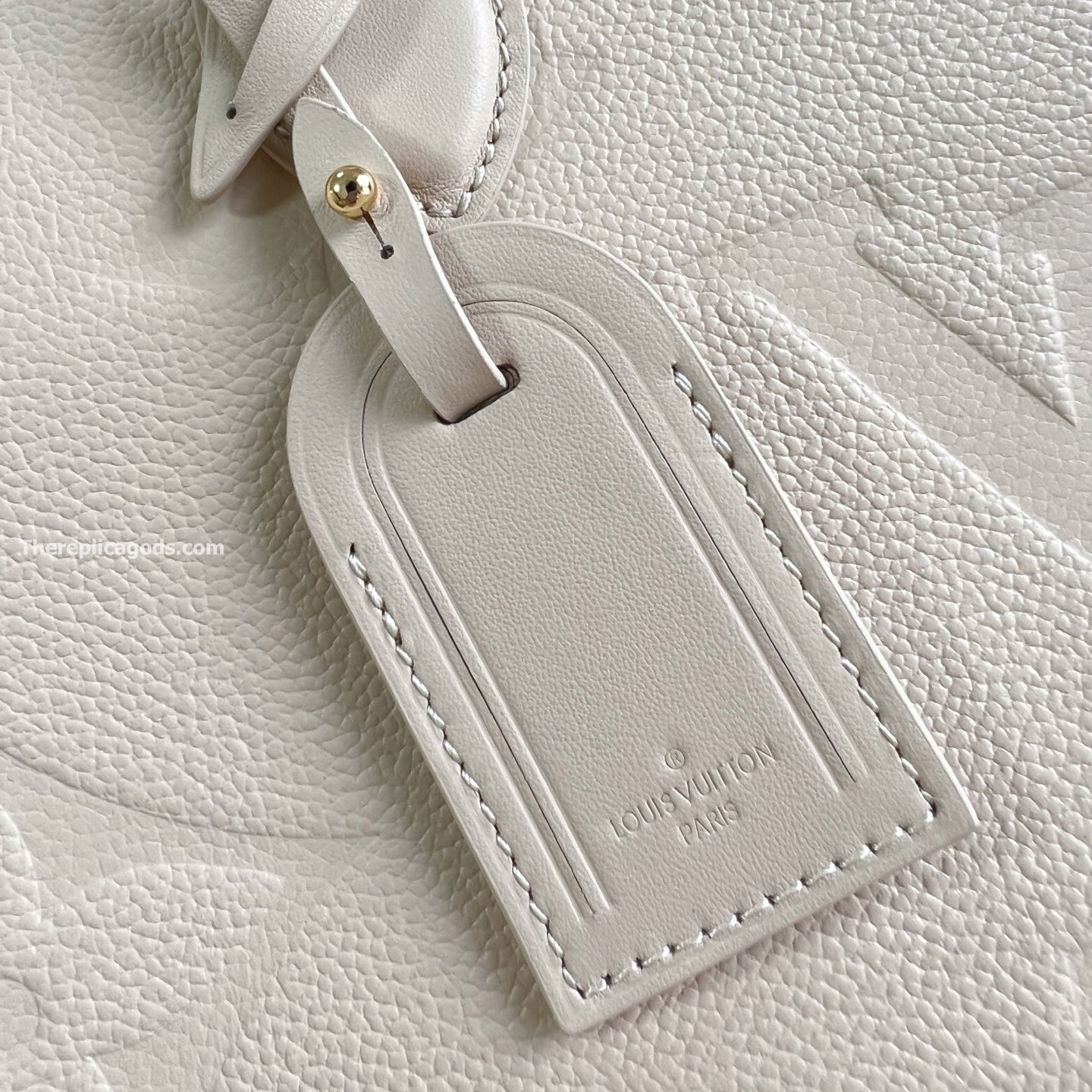 ONTHEGO MM BAG CREAM MONOGRAM EMPREINTE M46531