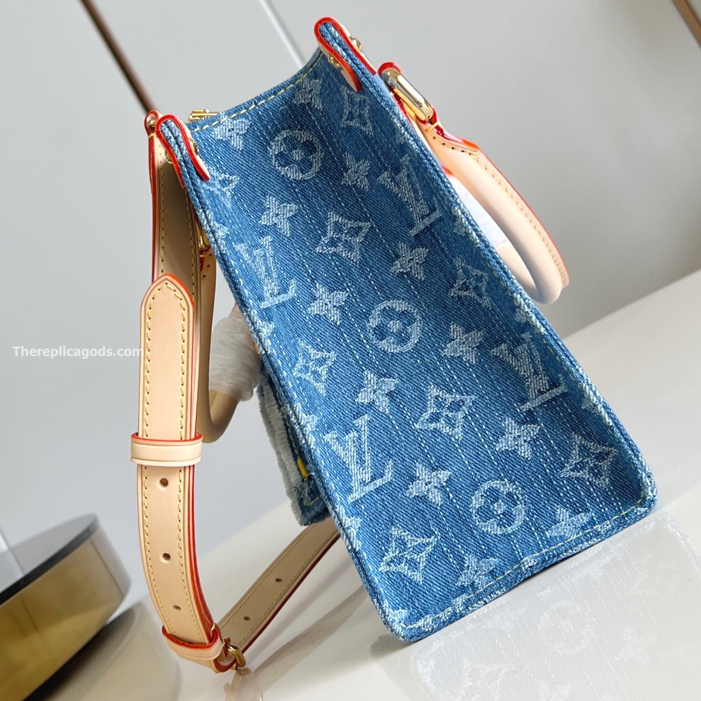 ONTHEGO PM BAG IN DENIM BLUE M14633