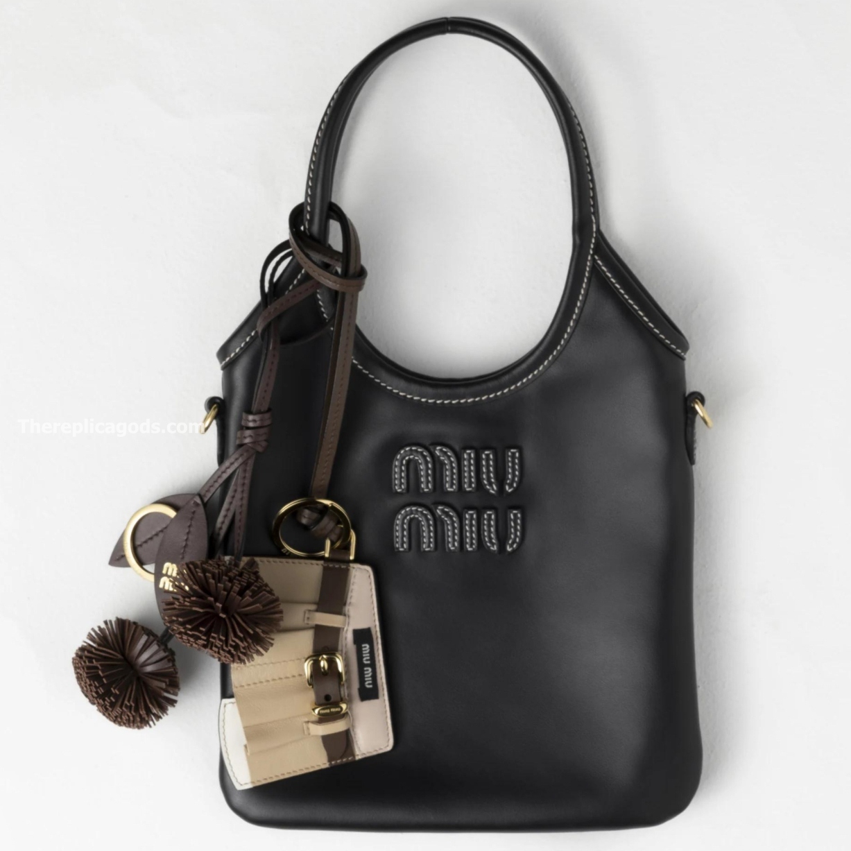 LEATHER KEYCHAIN TRICK IN BEIGE