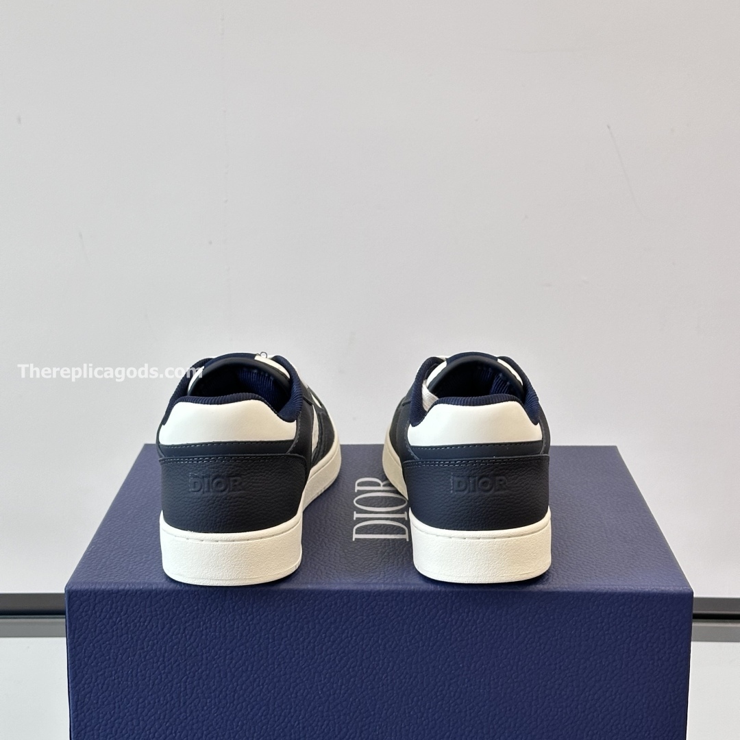 B27 UPTOWN LOW-TOP SNEAKERS NAVY BLUE AND WHITE GRAINED CALFSKIN WITH WHITE GRAVITY LEATHER - CD411