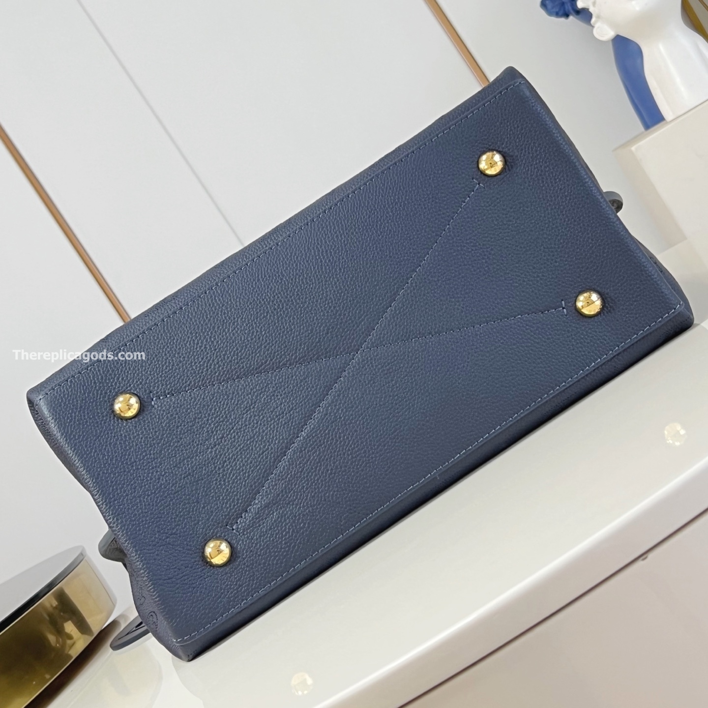 CARMEL HANDBAG NAVY MAHINA CALFSKIN LEATHER M14310