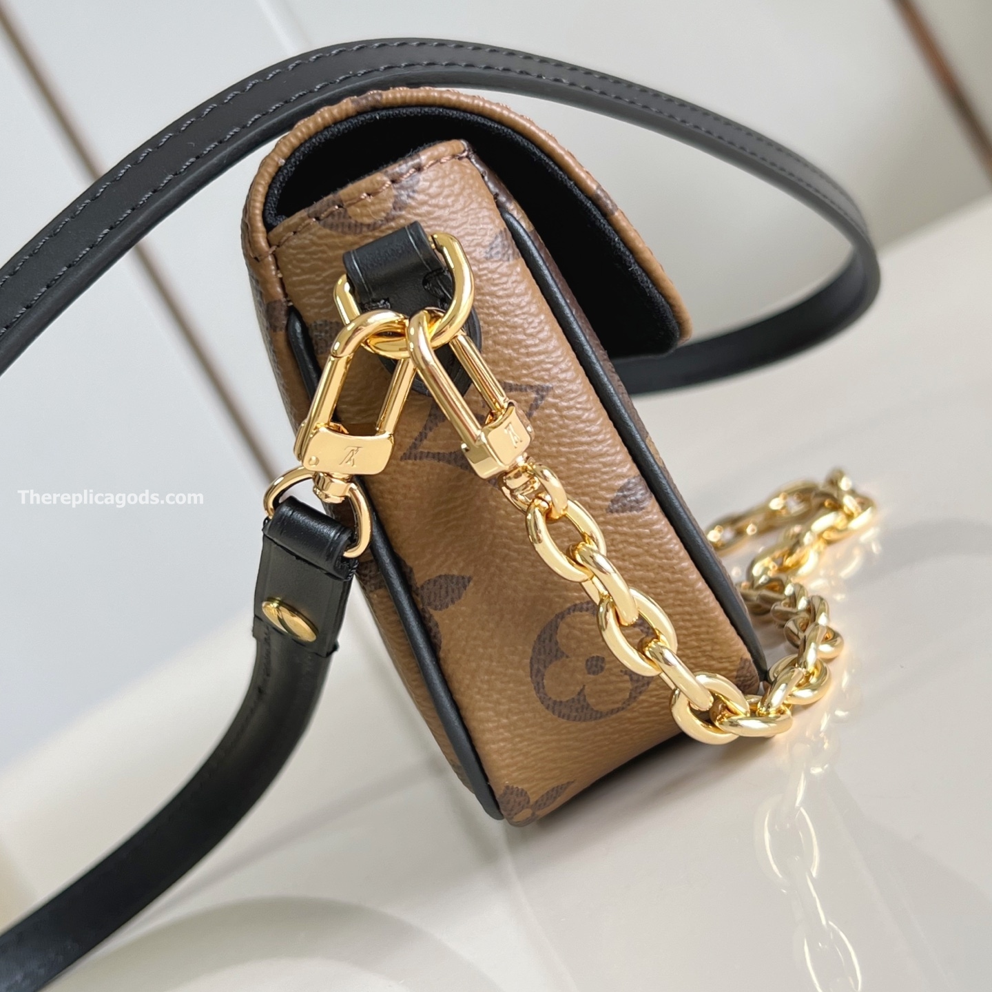 WALLET ON CHAIN IVY BROWN MONOGRAM REVERSE COATED CANVAS M26587