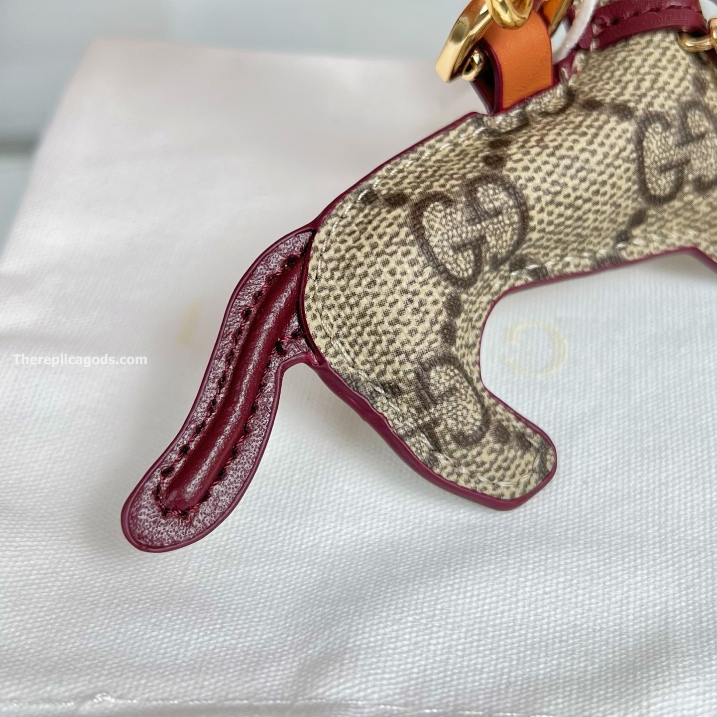 DOG-SHAPED BAG CHARM BEIGE AND DARK BROWN NEW GG MONOGRAM CANVAS