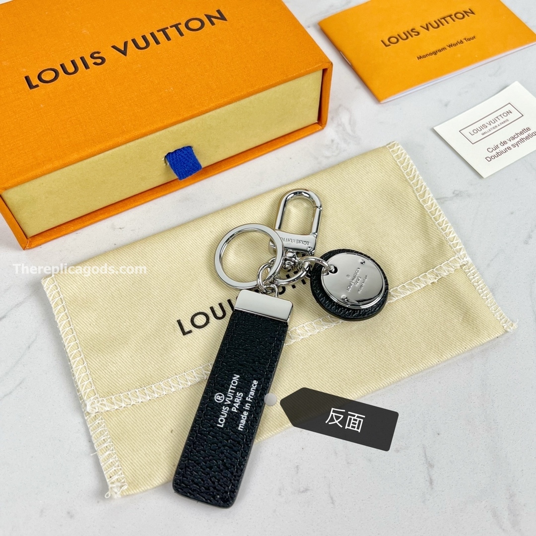 STEEL AND LEATHER BAG CHARM AND KEY HOLDER M00033