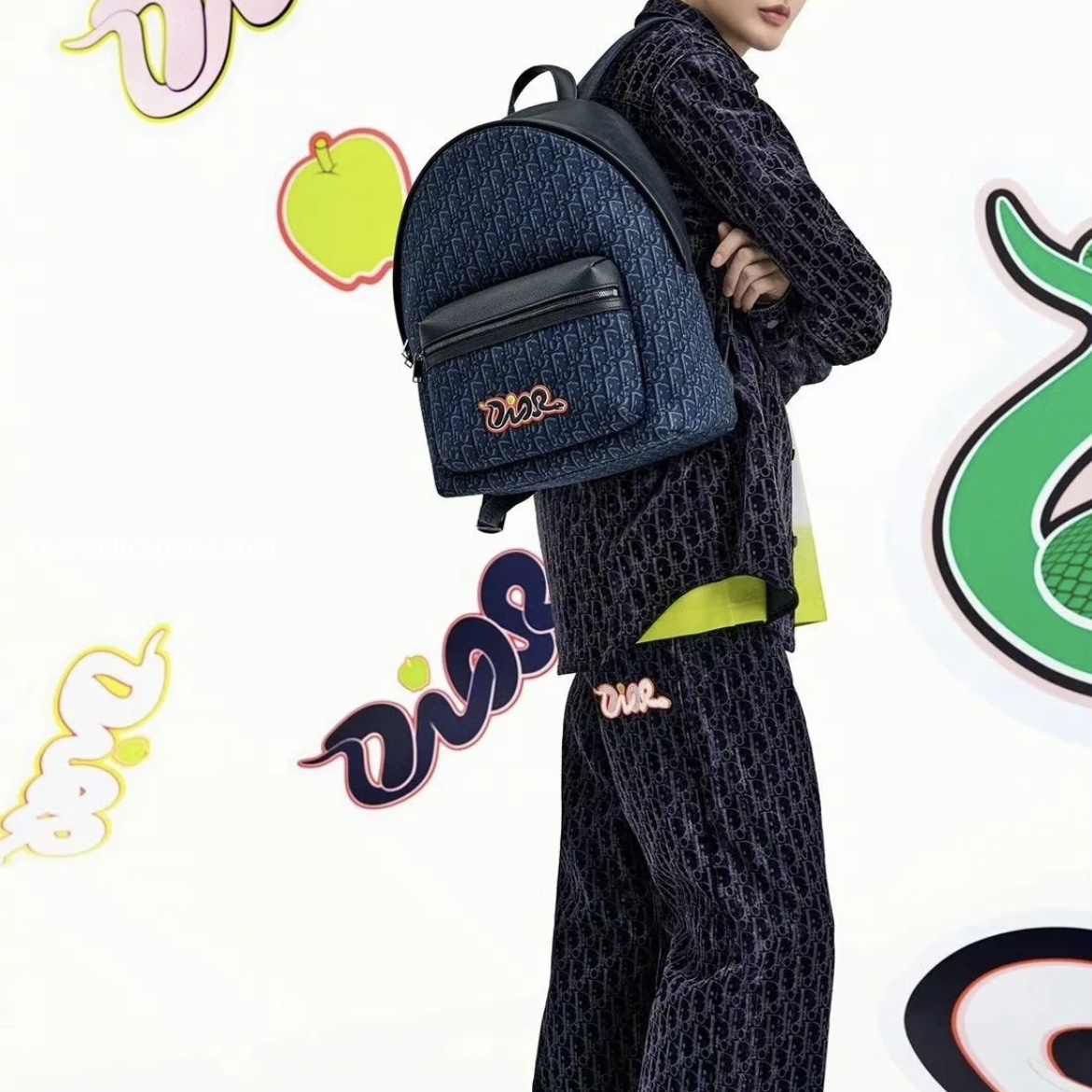 AND KAWS RIDER 2.0 ZIPPED BACKPACK NAVY BLUE GRAINED CALFSKIN AND OBLIQUE JACQUARD