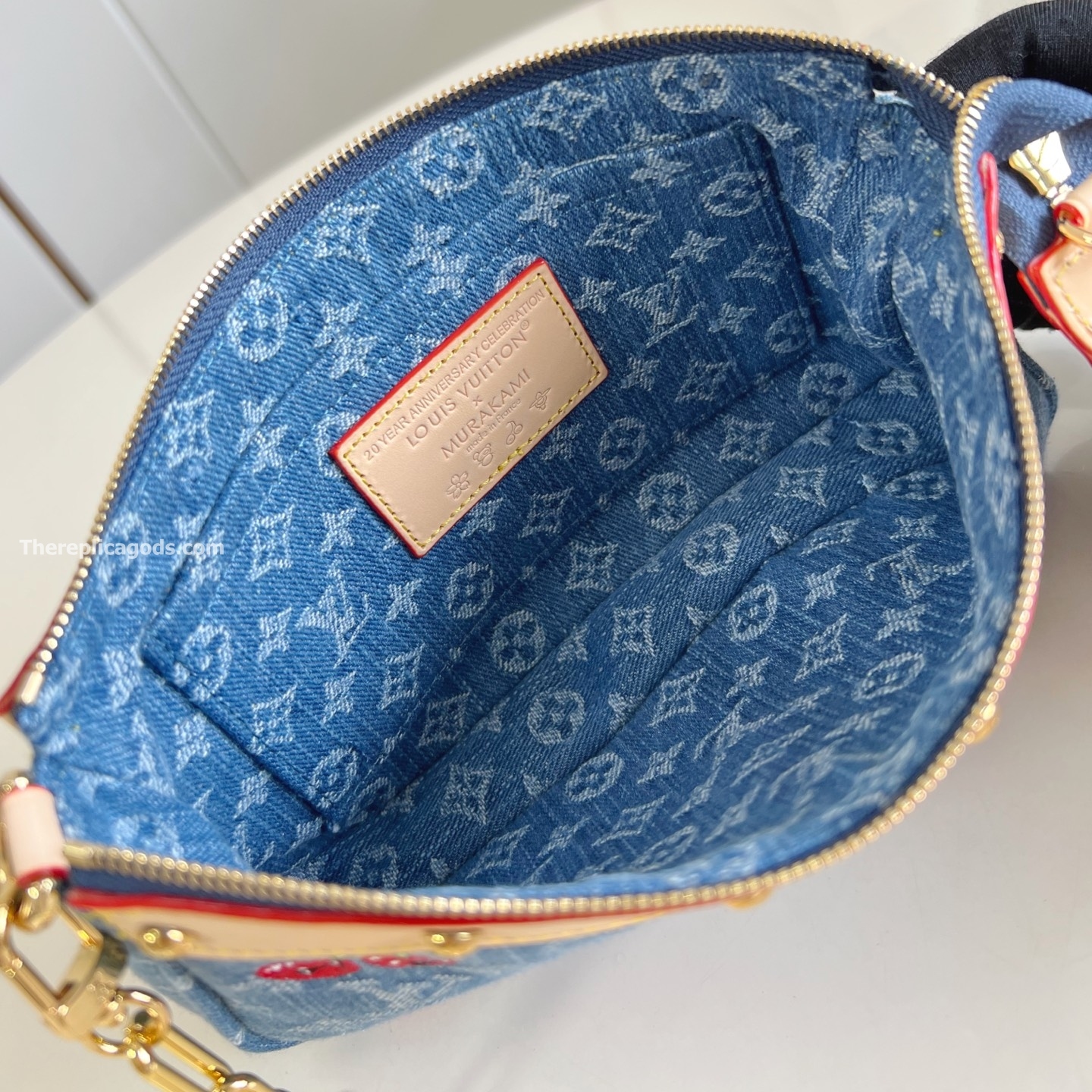 X TM POCHETTE ACCESSOIRES MONOGRAM CHERRY DENIM M13994