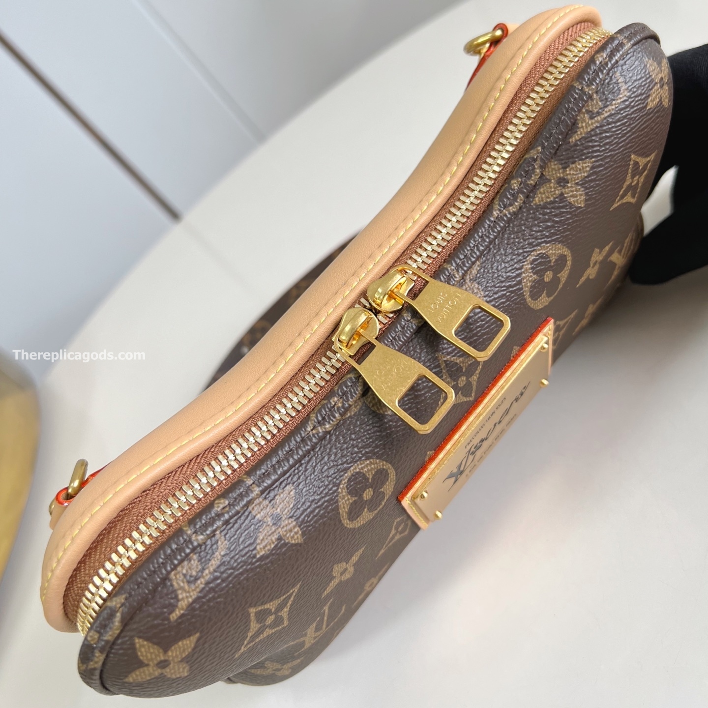 BONE WEARABLE WALLET BROWN MONOGRAM CANVAS M12615