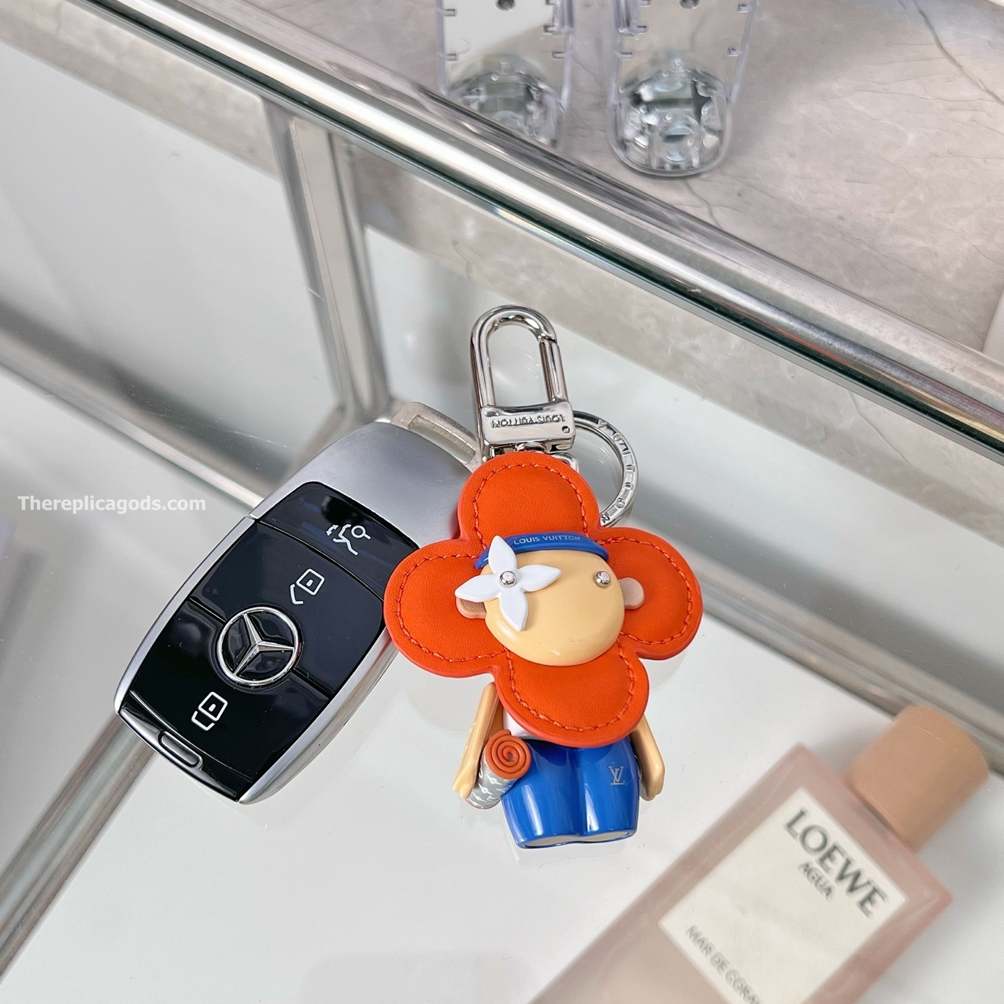 VIVIENNE GYM BAG CHARM AND KEY HOLDER M01198