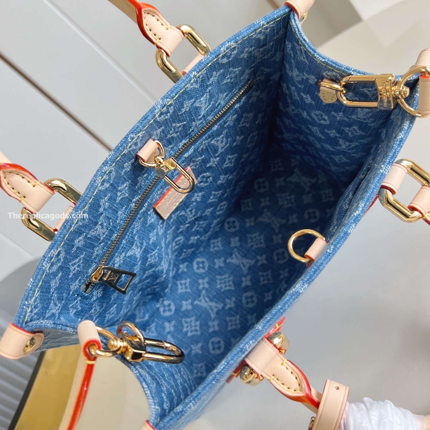 ONTHEGO PM BAG IN DENIM BLUE M14633