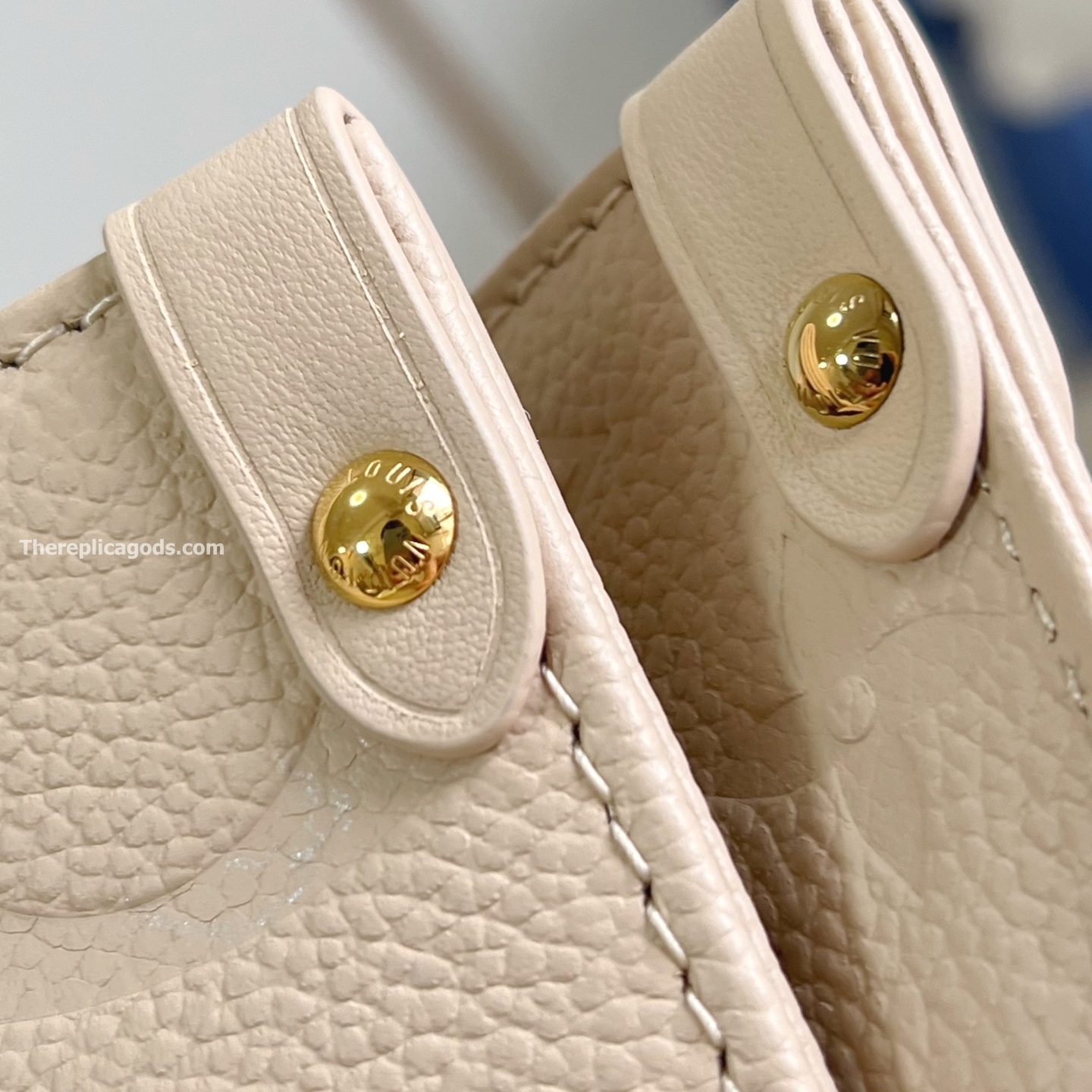 ONTHEGO MM BAG CREAM MONOGRAM EMPREINTE M46531