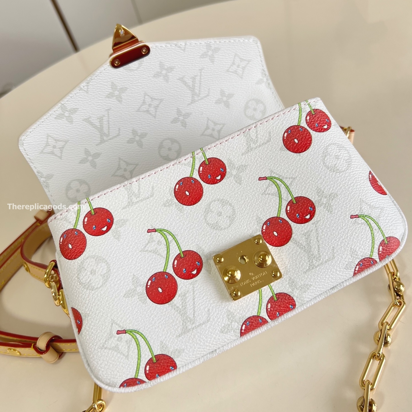 x TAKASHI MURAKAMI POCHETTE M?TIS EAST WEST WHITE MONOGRAM CANVAS M14231