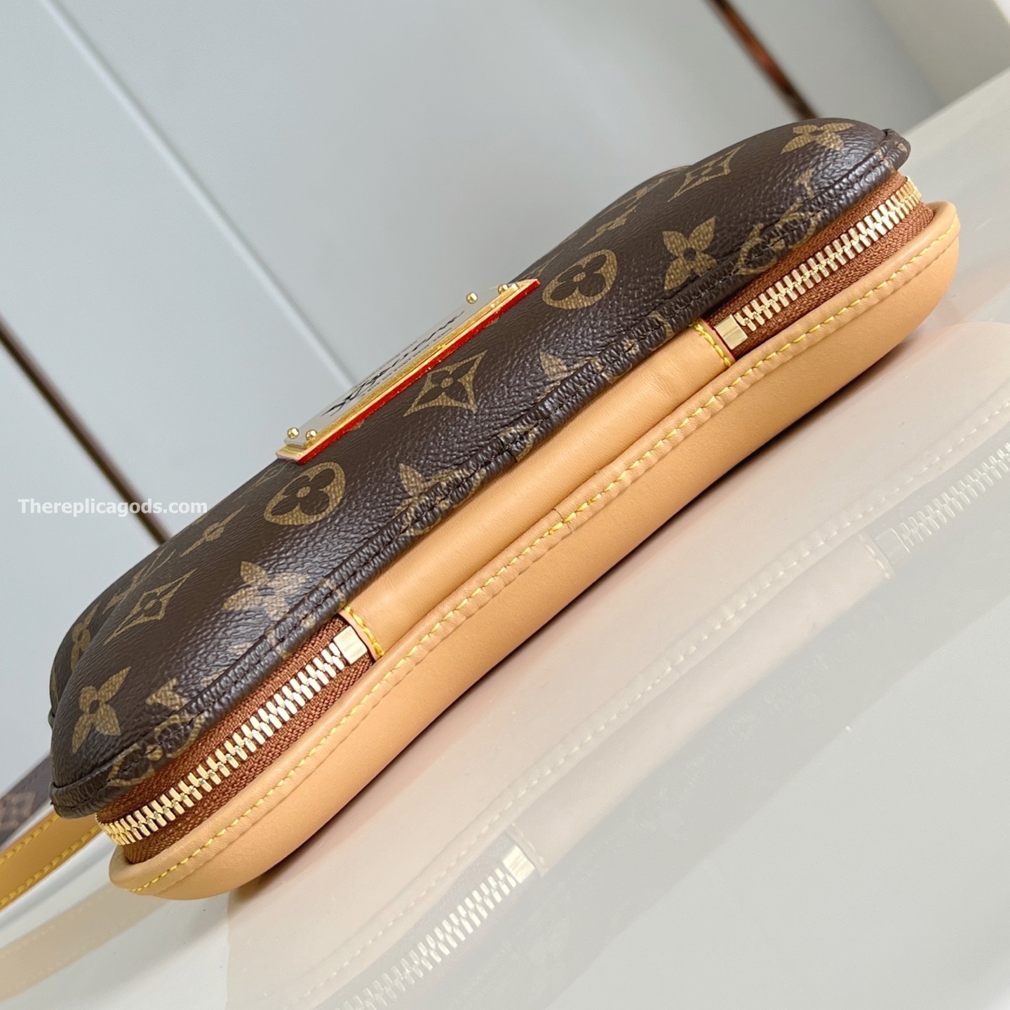BONE WEARABLE WALLET BROWN MONOGRAM CANVAS M12615