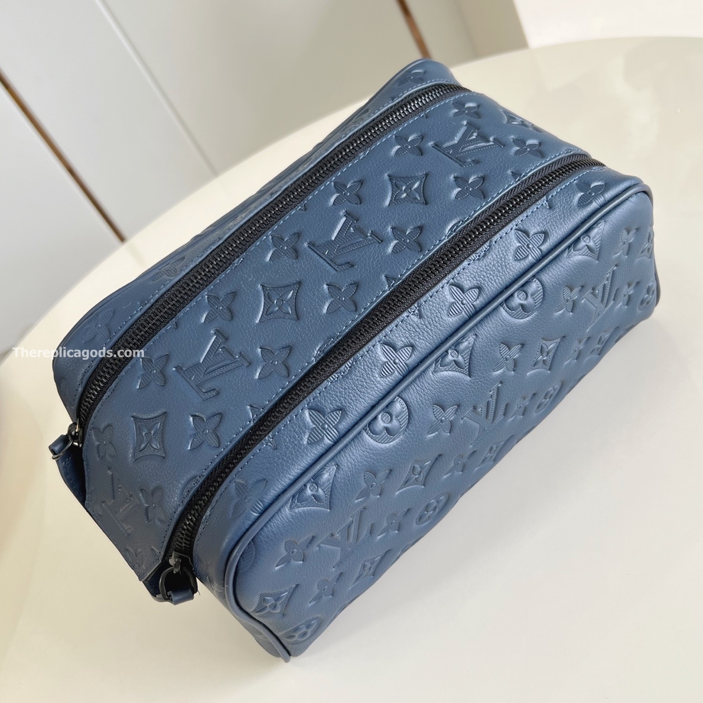DOPP KIT NAVY BLUE MONOGRAM SHADOW M14843