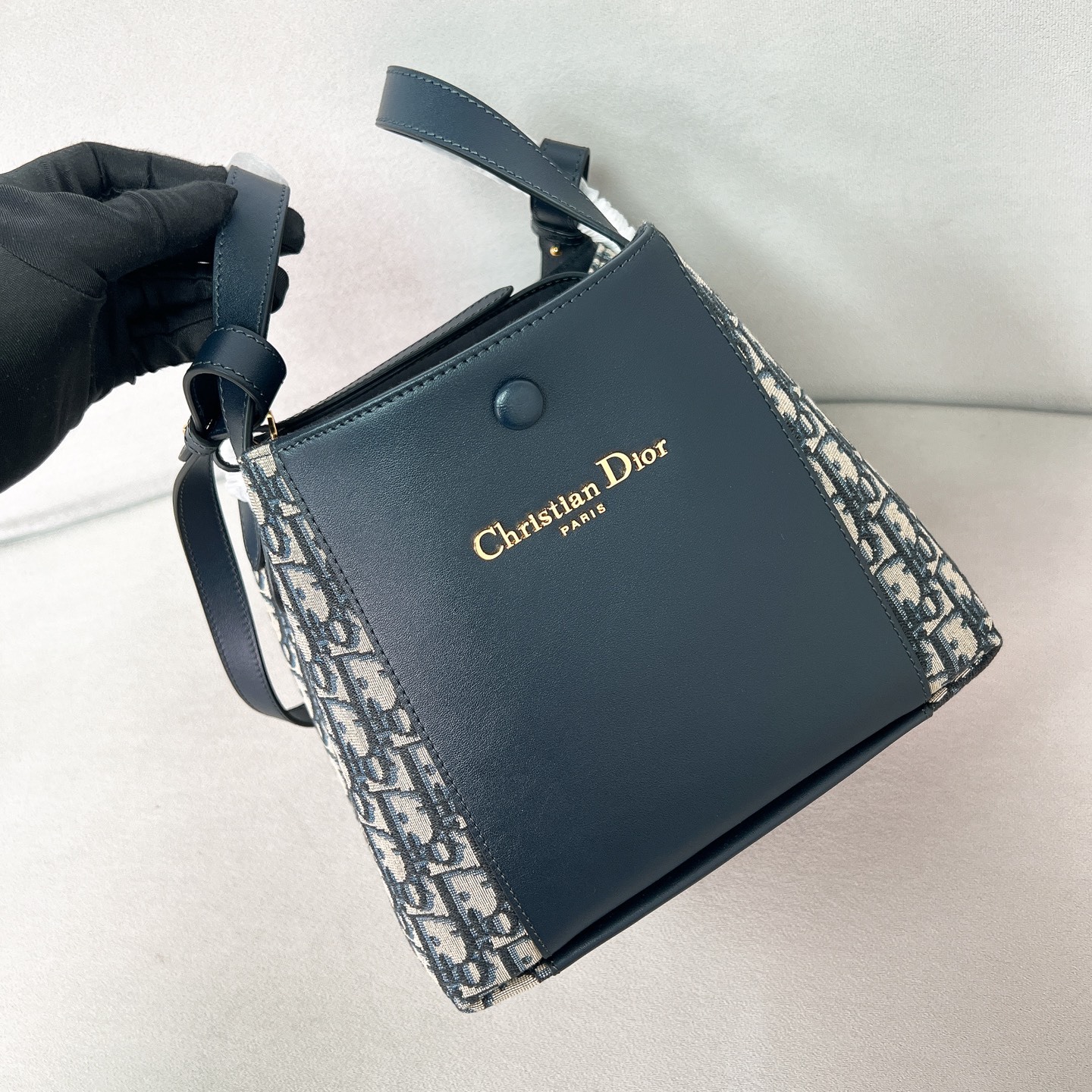 SMALL SIGNATURE BUCKET BAG BLUE OBLIQUE JACQUARD AND SMOOTH CALFSKIN