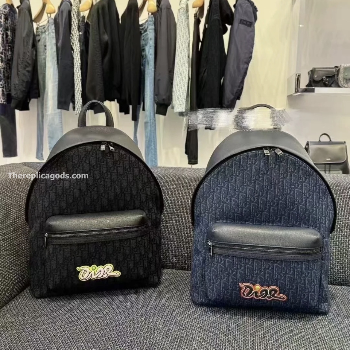 AND KAWS RIDER 2.0 ZIPPED BACKPACK NAVY BLUE GRAINED CALFSKIN AND OBLIQUE JACQUARD
