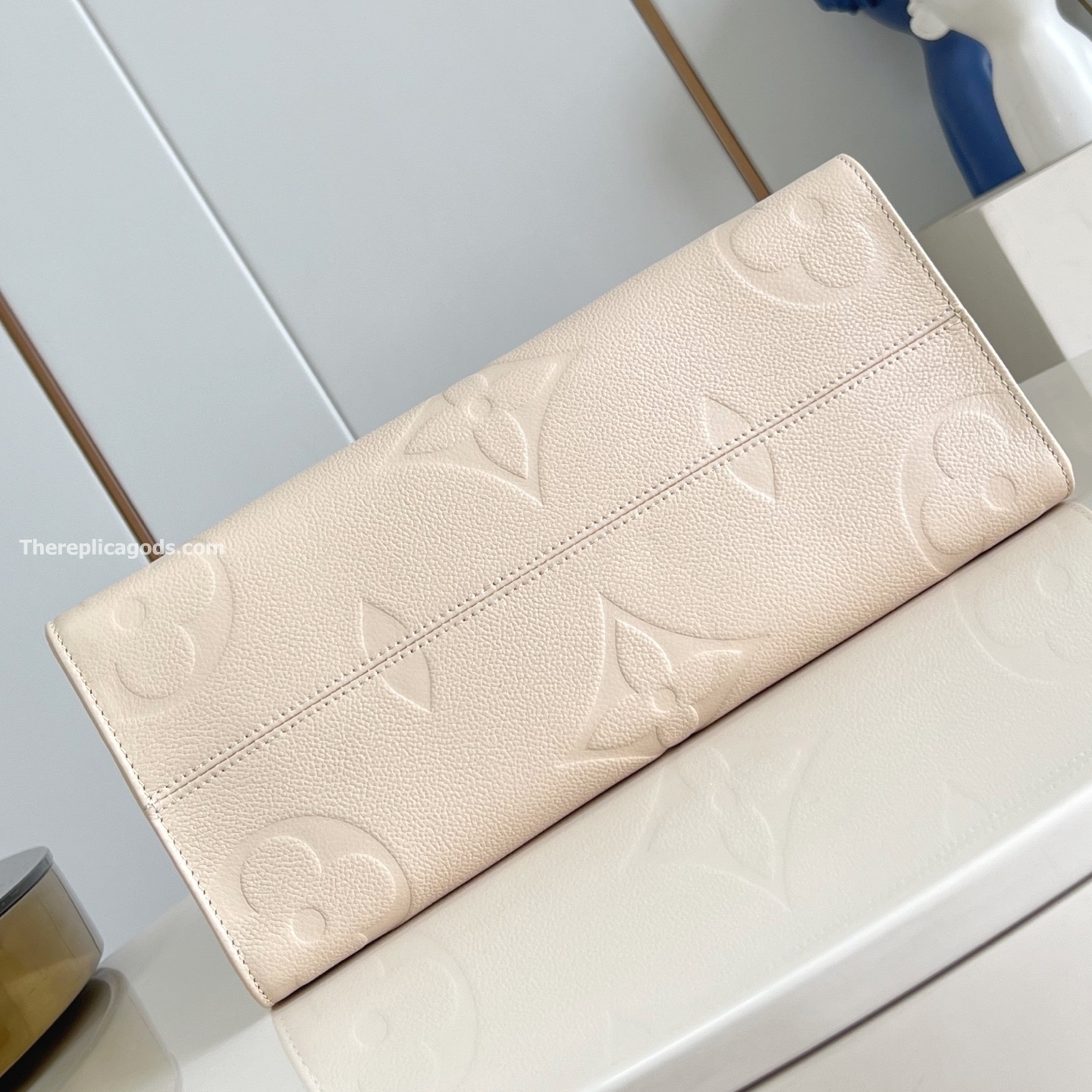 ONTHEGO MM BAG CREAM MONOGRAM EMPREINTE M46531