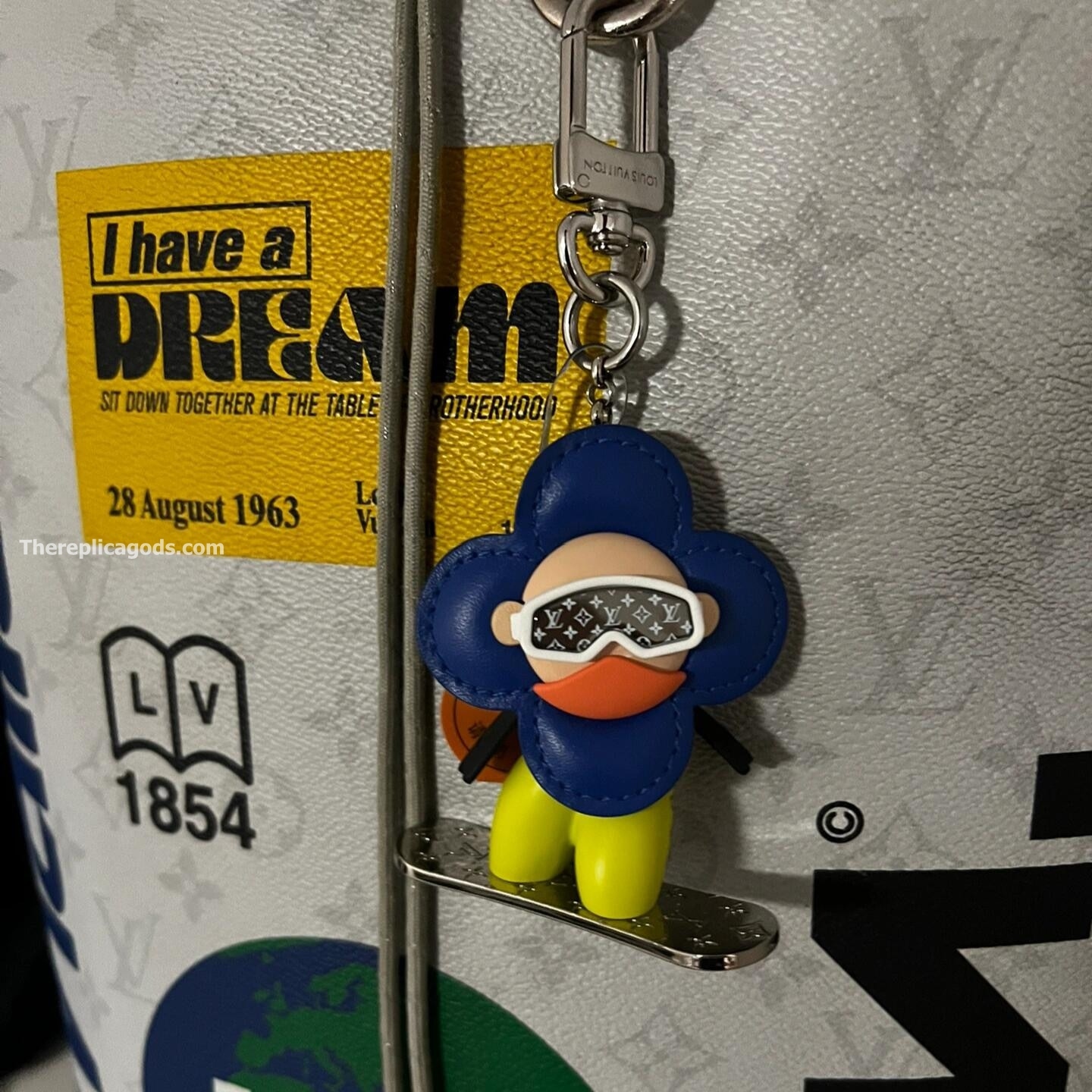 VIVIENNE SNOWBOARD BAG CHARM AND KEY HOLDER