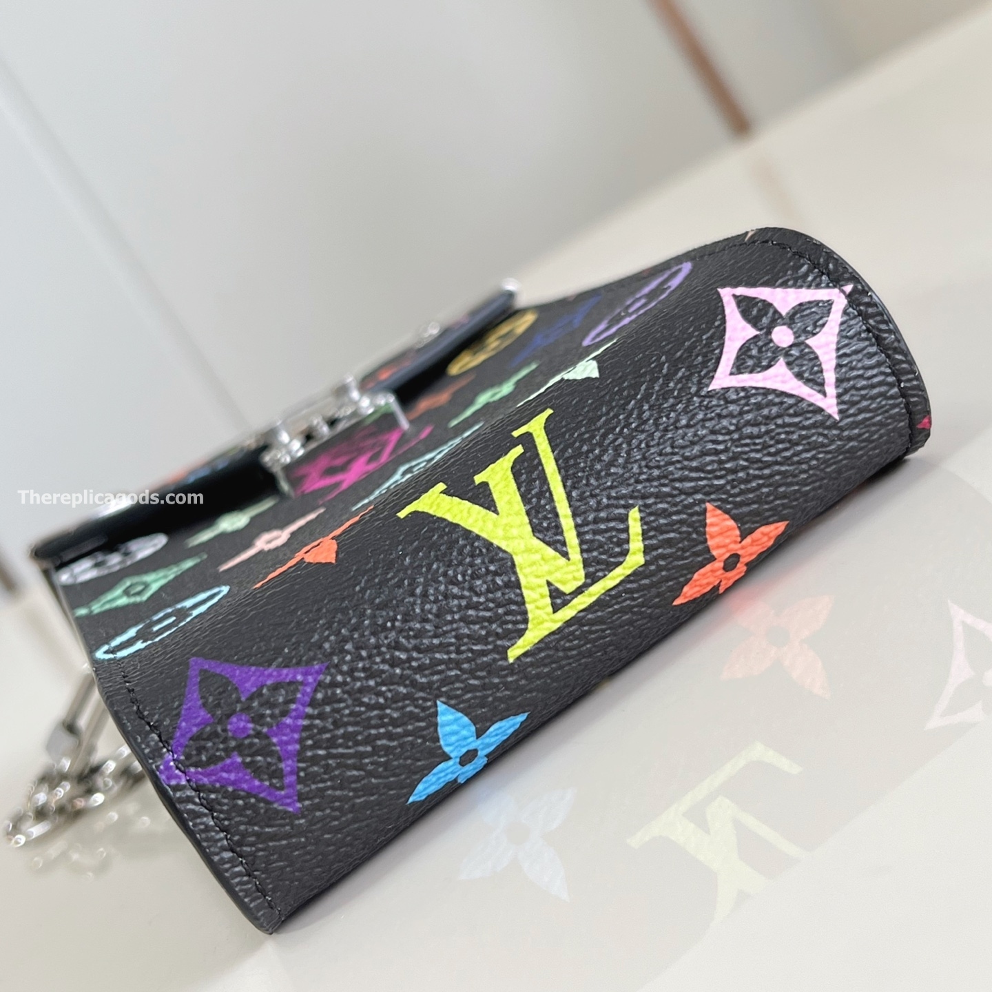 LV x TM PHONE POUCH METIS MULTICOLORED M14098