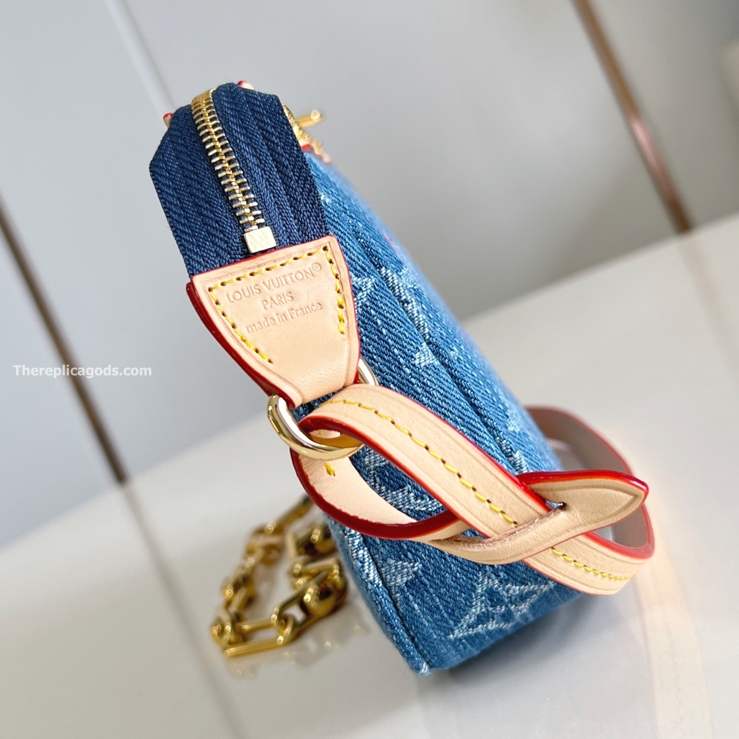 X TM POCHETTE ACCESSOIRES MONOGRAM CHERRY DENIM M13994