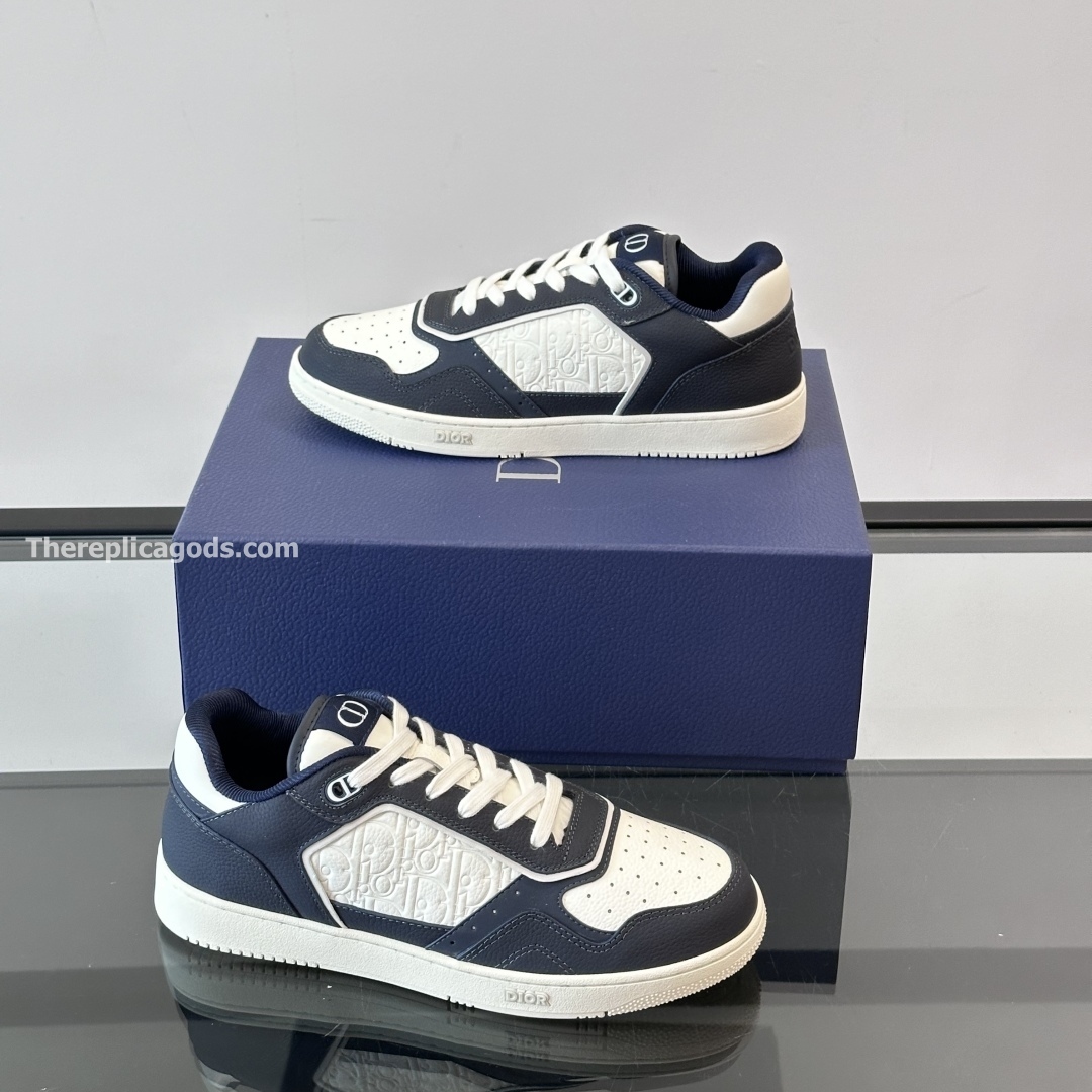 B27 UPTOWN LOW-TOP SNEAKERS NAVY BLUE AND WHITE GRAINED CALFSKIN WITH WHITE GRAVITY LEATHER - CD411