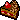 Pixel art chocolate cake with a bite out of it.