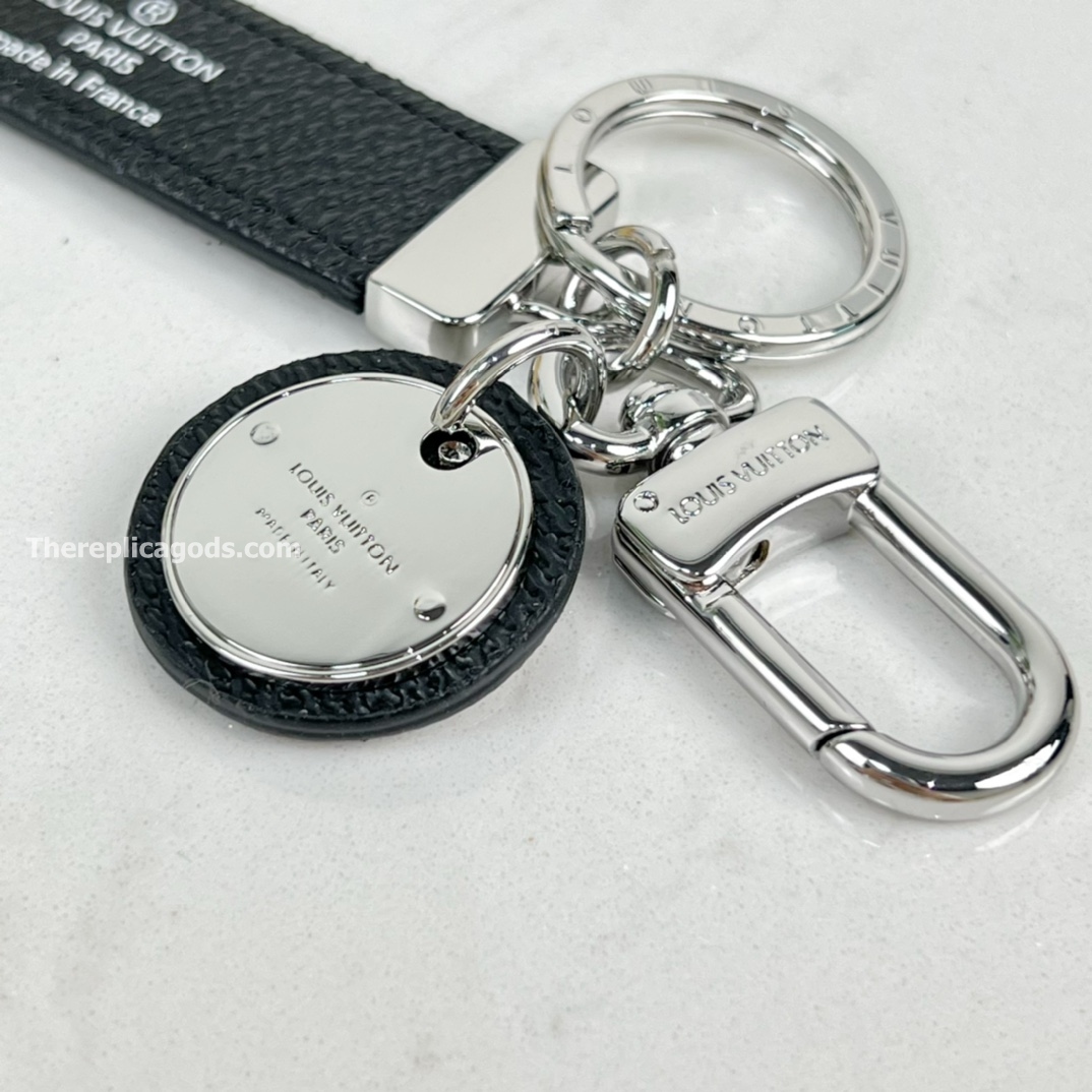 STEEL AND LEATHER BAG CHARM AND KEY HOLDER M00033
