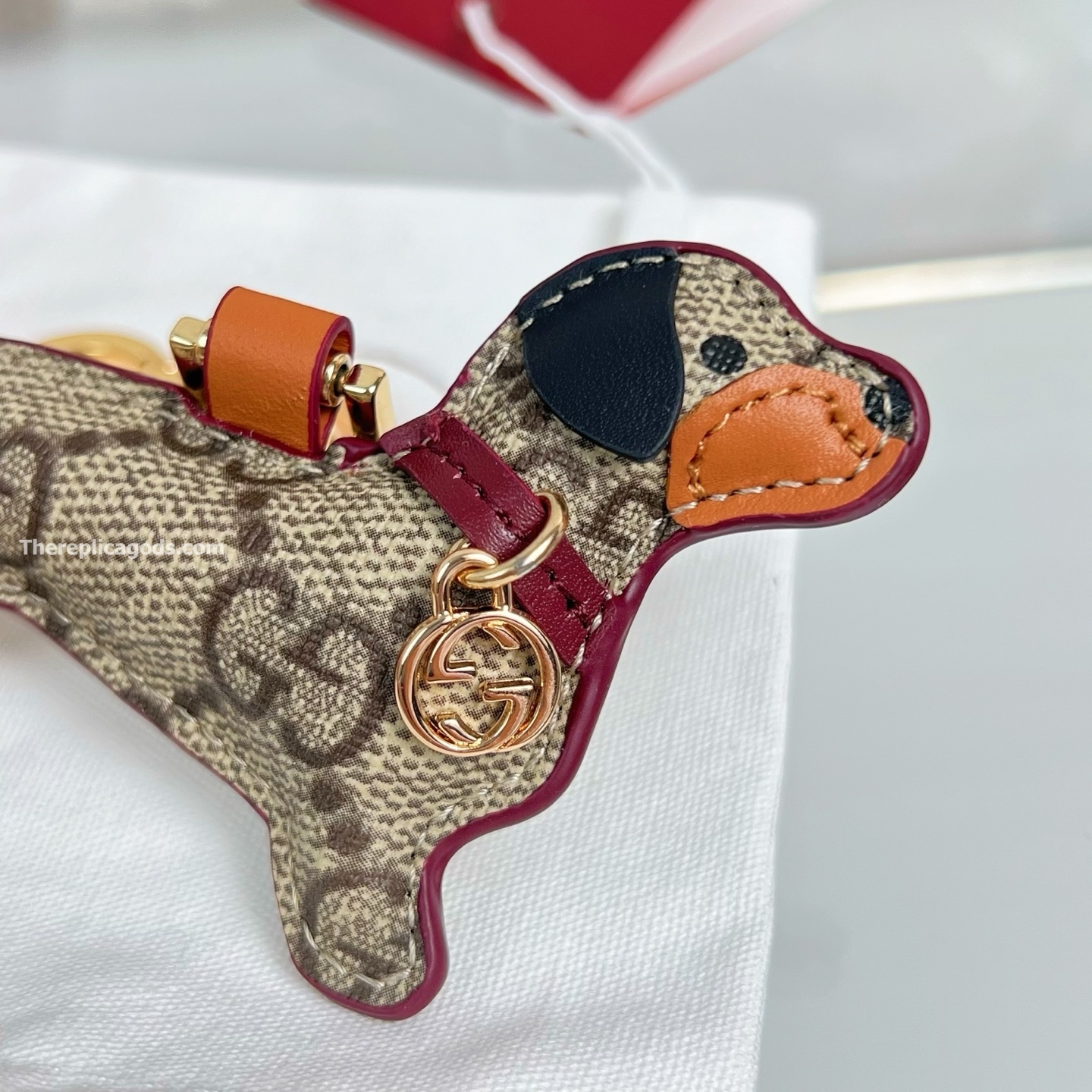 DOG-SHAPED BAG CHARM BEIGE AND DARK BROWN NEW GG MONOGRAM CANVAS
