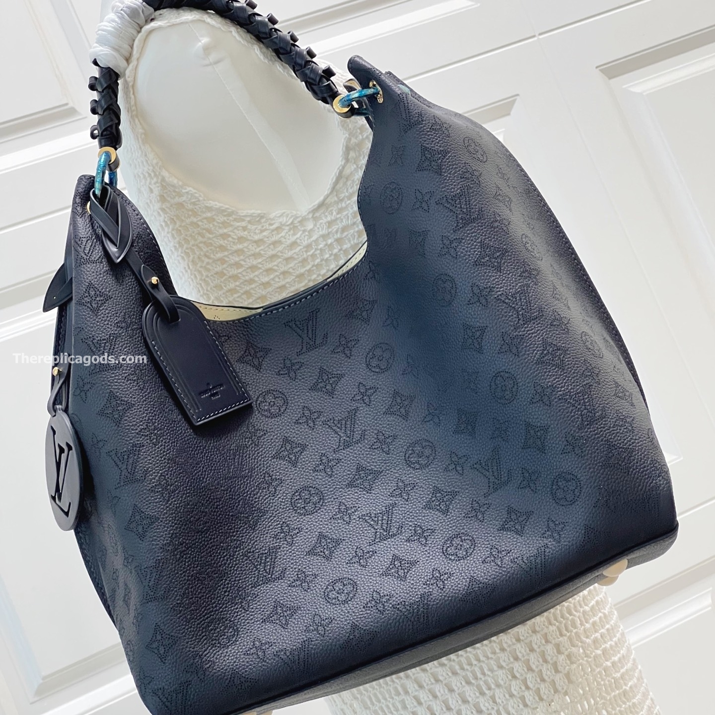 CARMEL HANDBAG NAVY MAHINA CALFSKIN LEATHER M14310