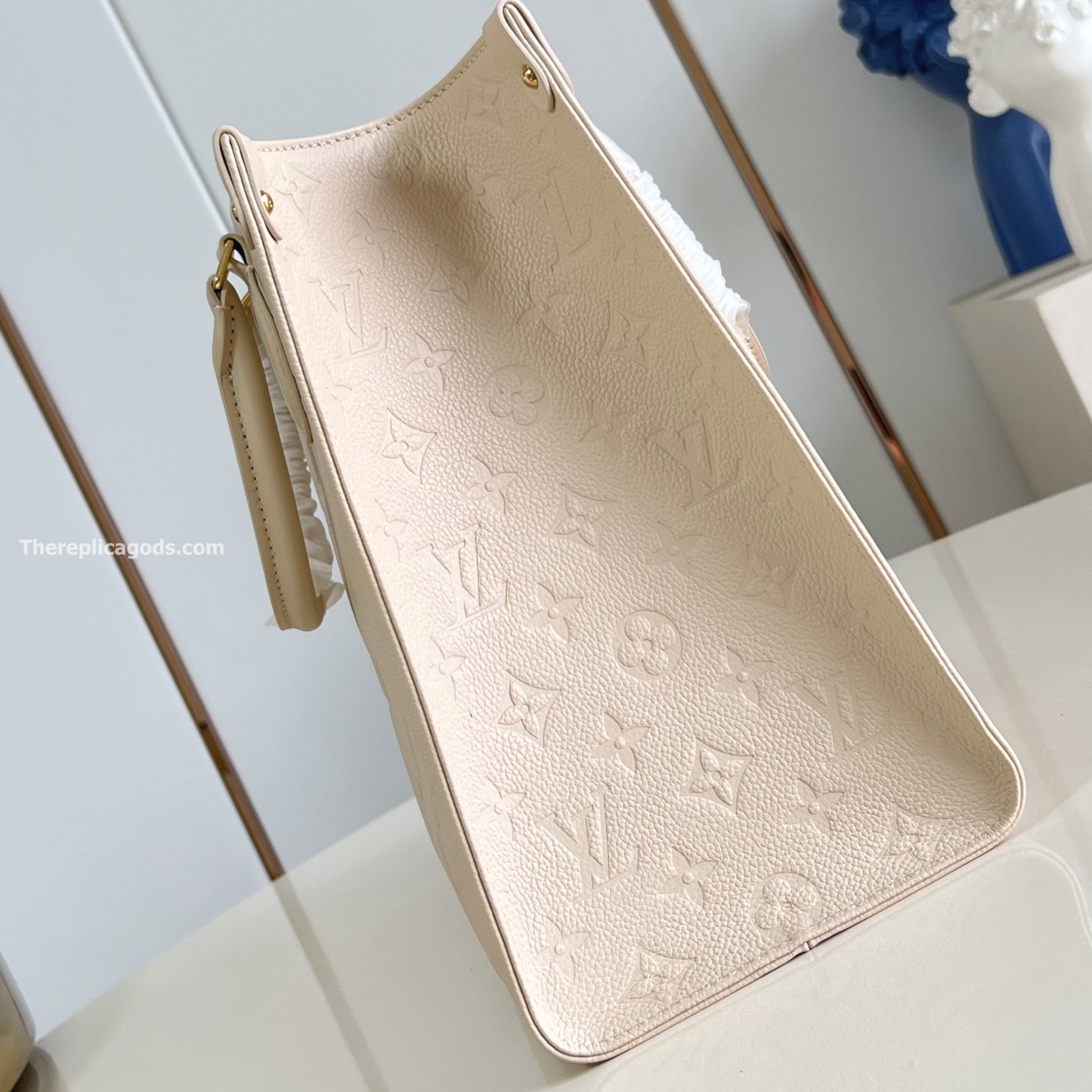 ONTHEGO MM BAG CREAM MONOGRAM EMPREINTE M46531