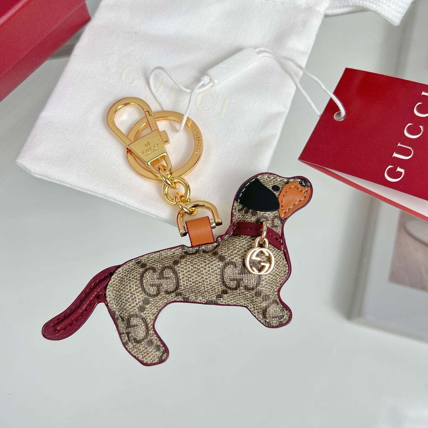 DOG-SHAPED BAG CHARM BEIGE AND DARK BROWN NEW GG MONOGRAM CANVAS