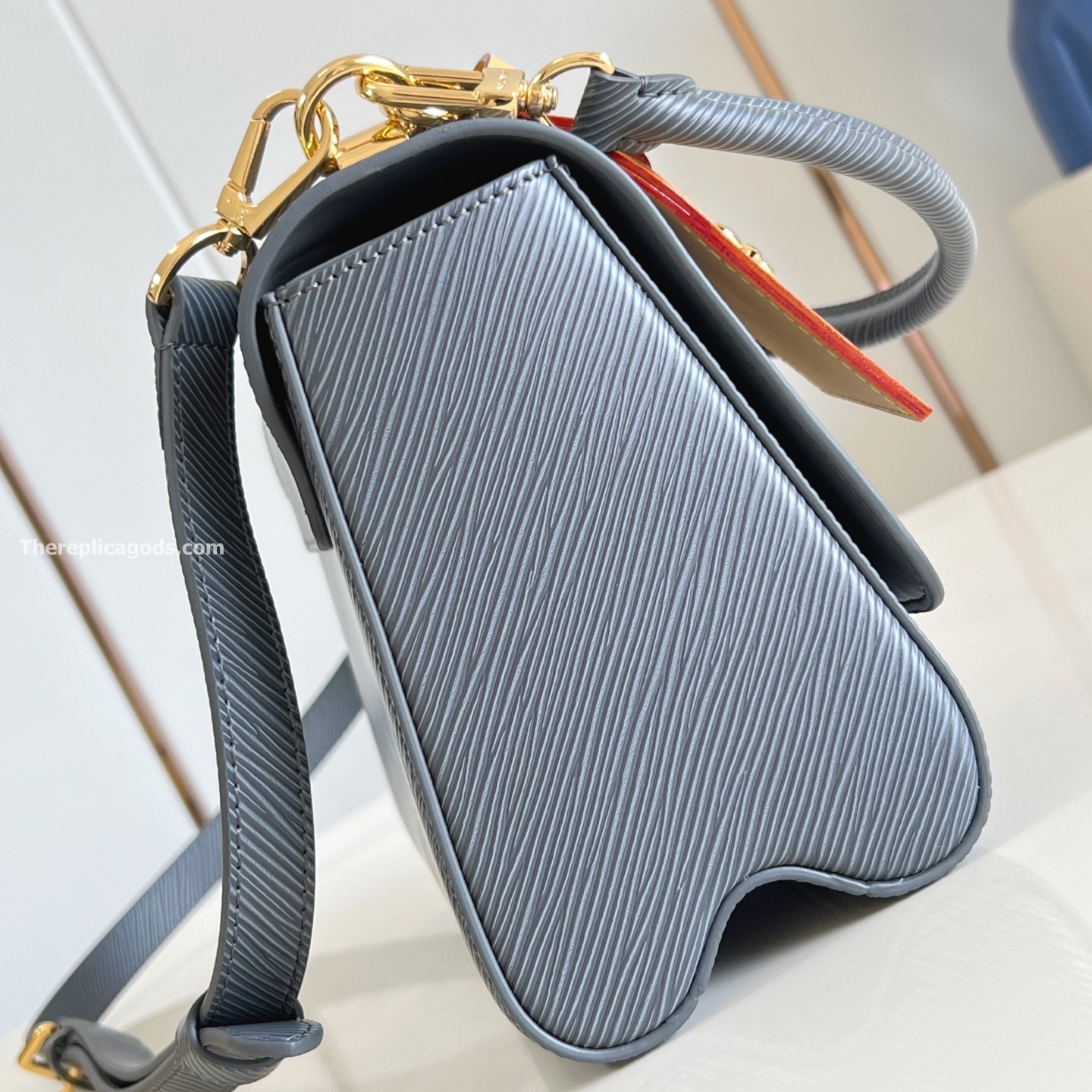 TWIST MM BAG GRAY EPI LEATHER M14059