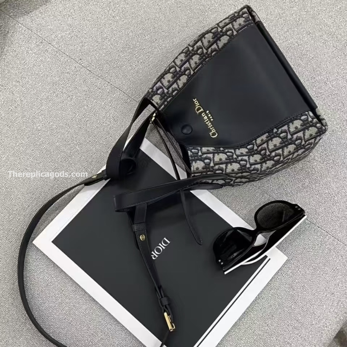 SMALL SIGNATURE BUCKET BAG BLUE OBLIQUE JACQUARD AND SMOOTH CALFSKIN