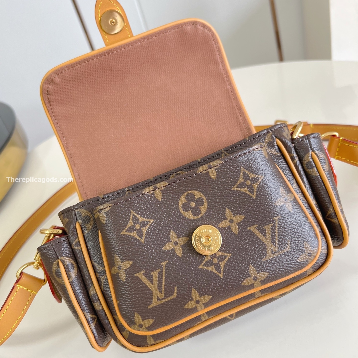 CARGO WEARABLE WALLET BROWN MONOGRAM CANVAS M14742