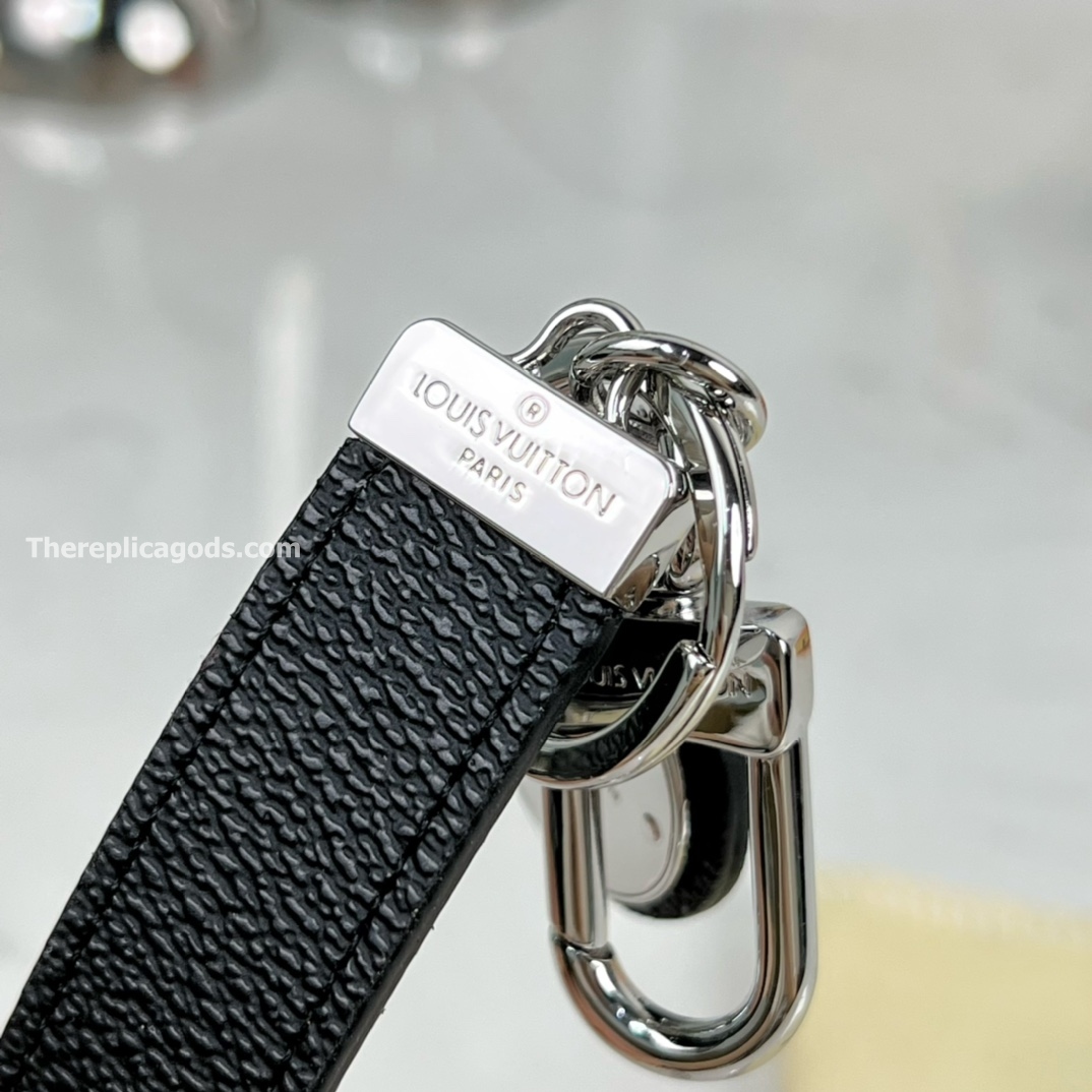 STEEL AND LEATHER BAG CHARM AND KEY HOLDER M00033