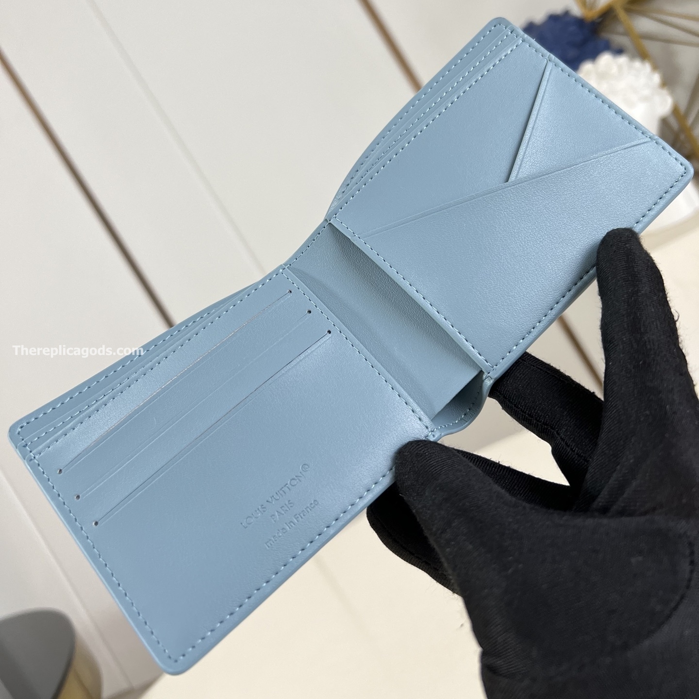 MULTIPLE WALLET SKY BLUE MONOGRAM SHADOW CALF LEATHER M14802