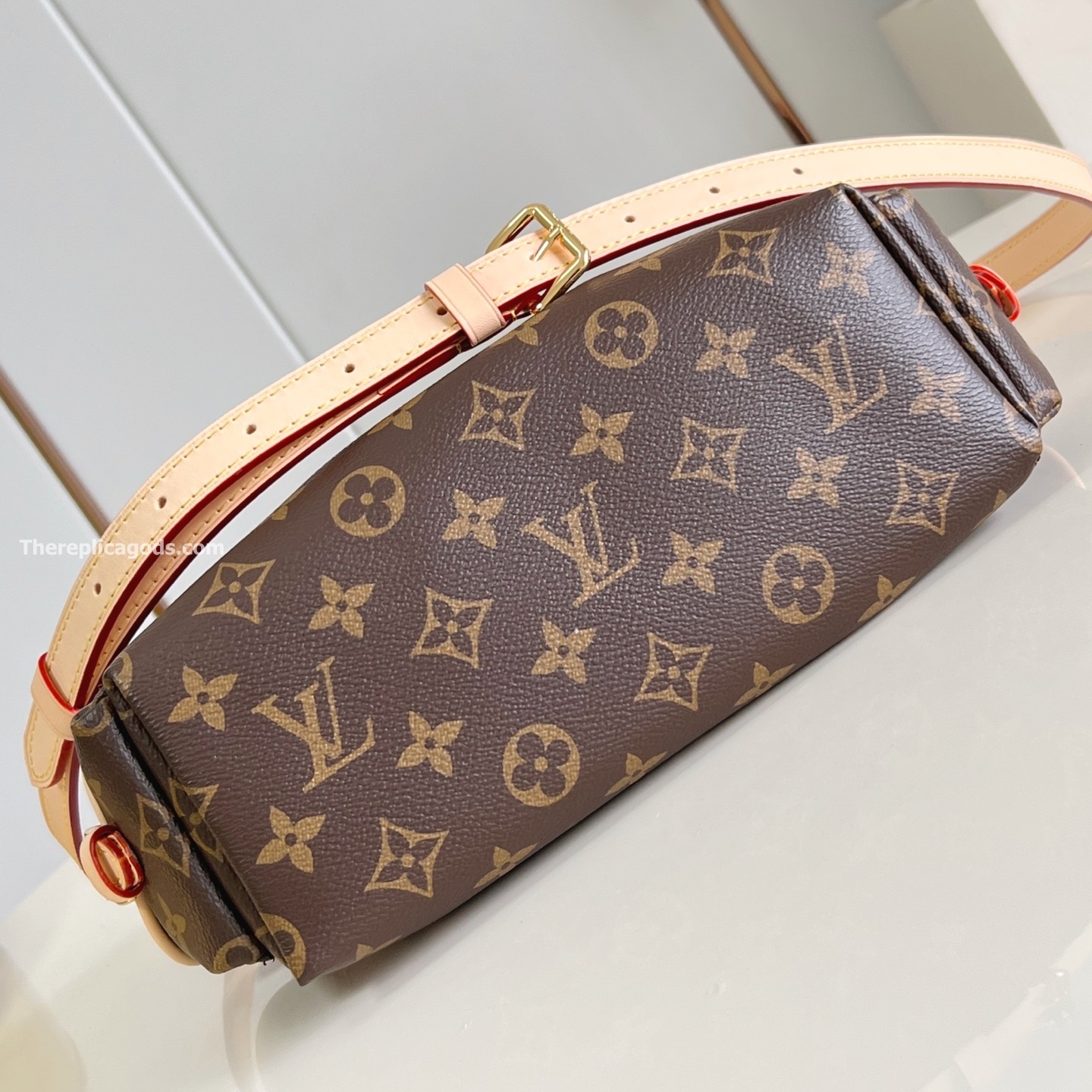 ODYSSEE HANDBAG BROWN MONOGRAM CANVAS M25085