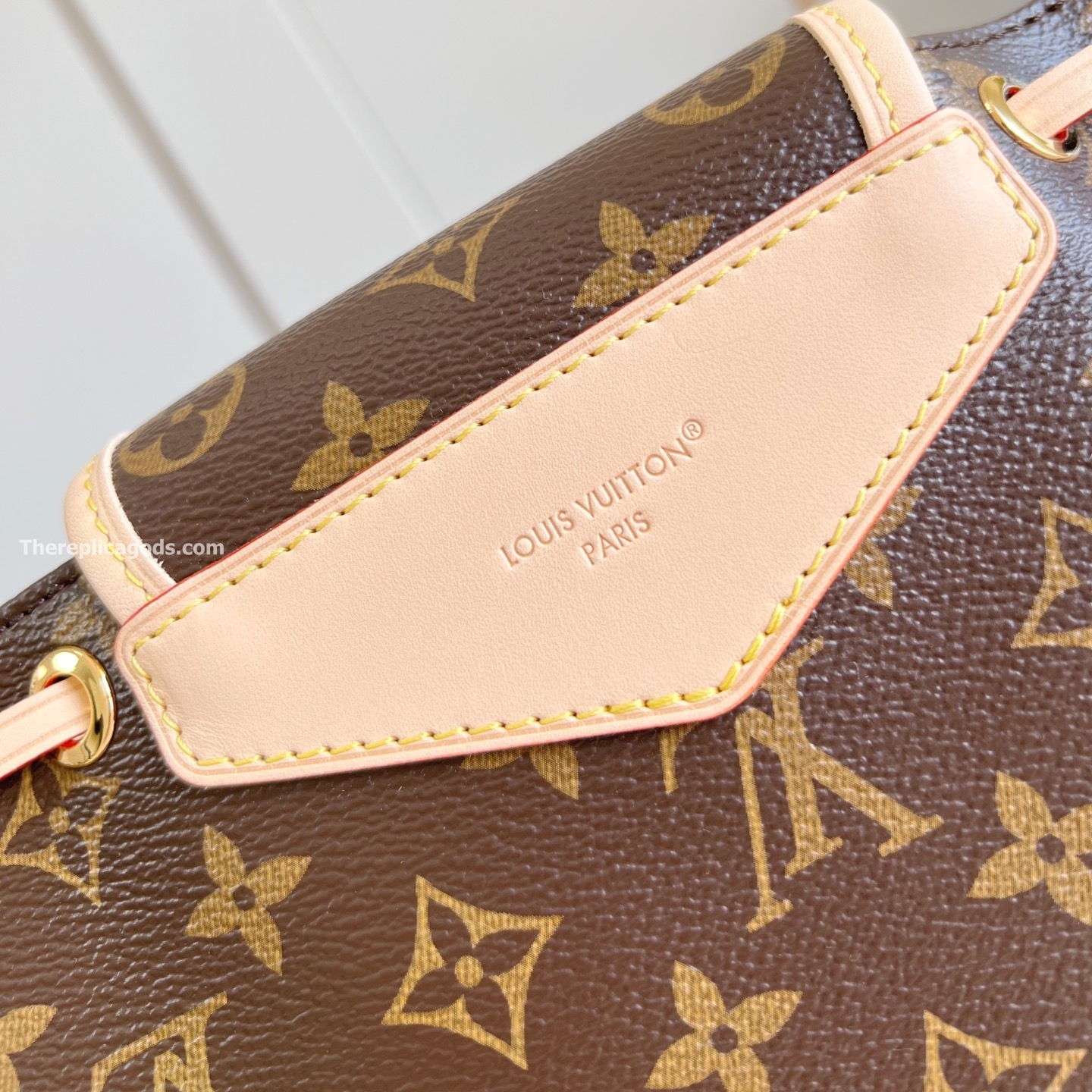 ODYSSEE HANBAG BROWN MONOGRAM CANVAS M25085