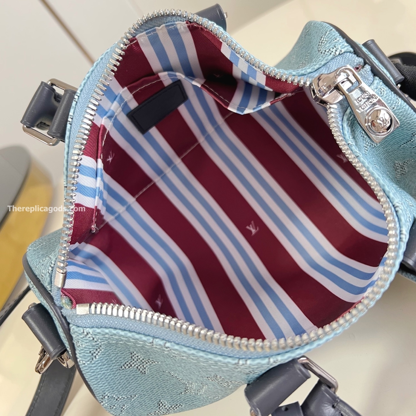 KEEPALL BANDOULIERE 25 BLUE MONOGRAM HERITAGE CANVAS M14681