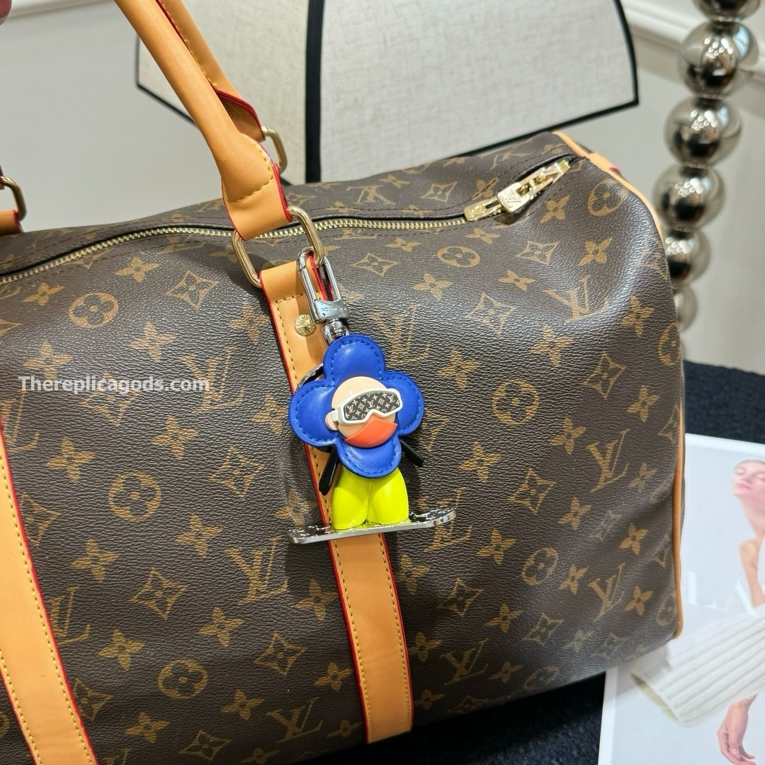 VIVIENNE SNOWBOARD BAG CHARM AND KEY HOLDER