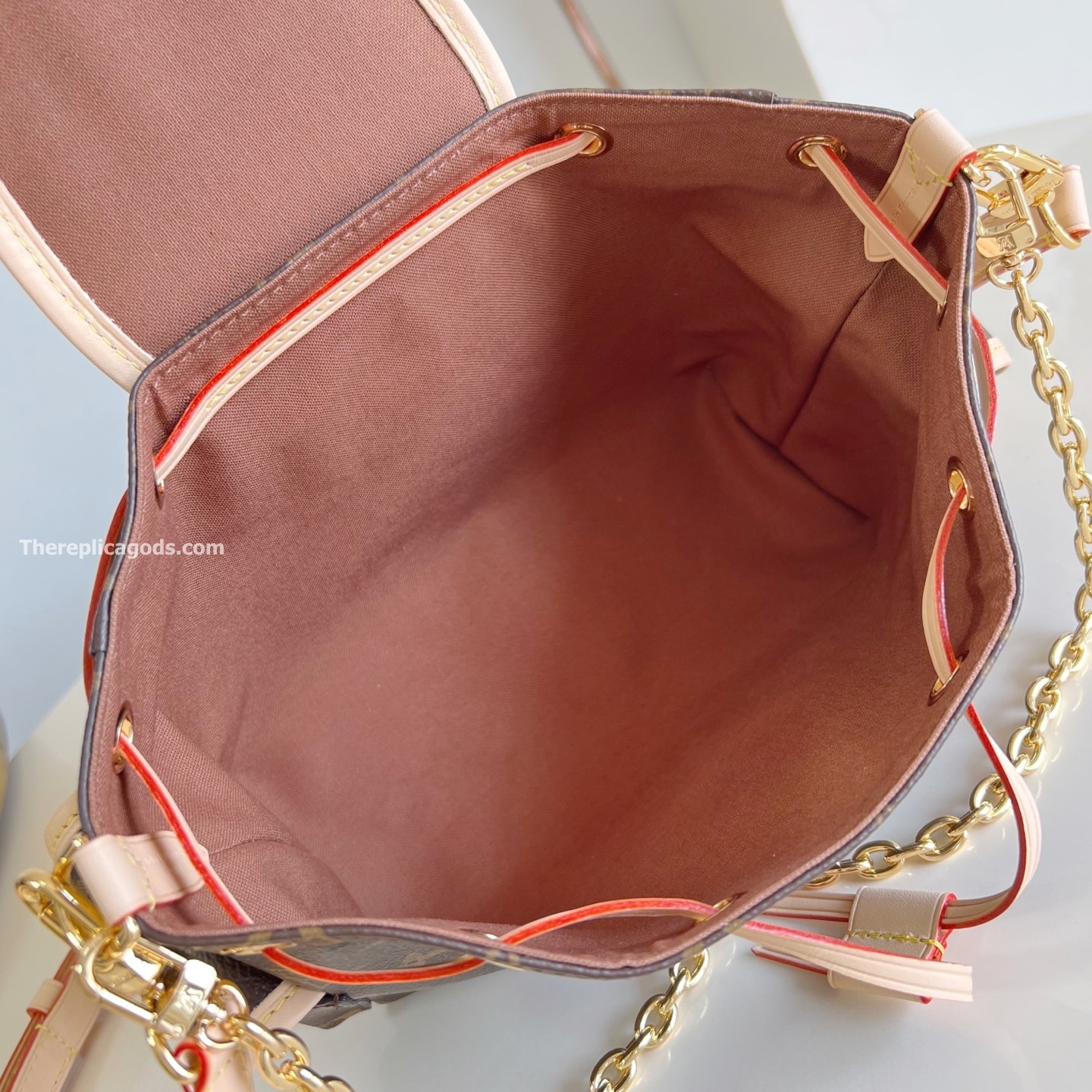 ODYSSEE HANBAG BROWN MONOGRAM CANVAS M25085