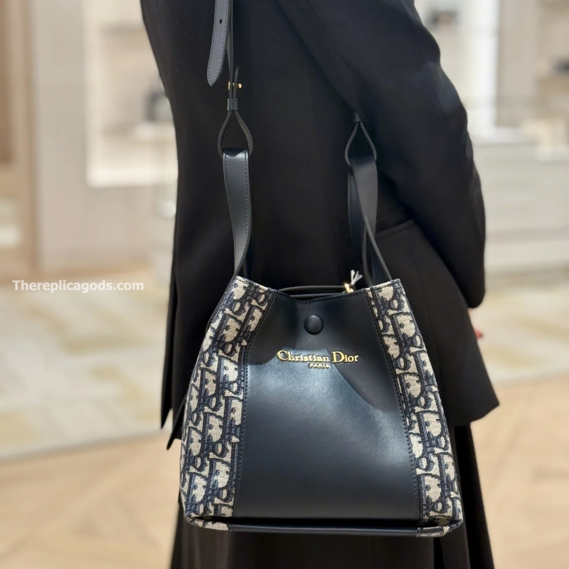 SMALL SIGNATURE BUCKET BAG BLUE OBLIQUE JACQUARD AND SMOOTH CALFSKIN