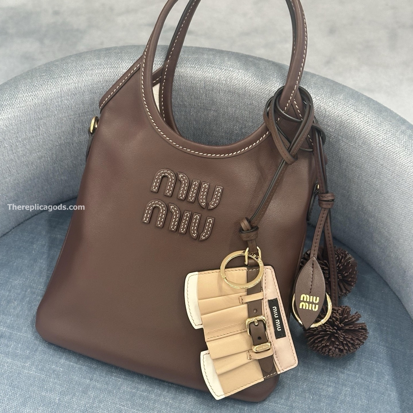 LEATHER KEYCHAIN TRICK IN BEIGE