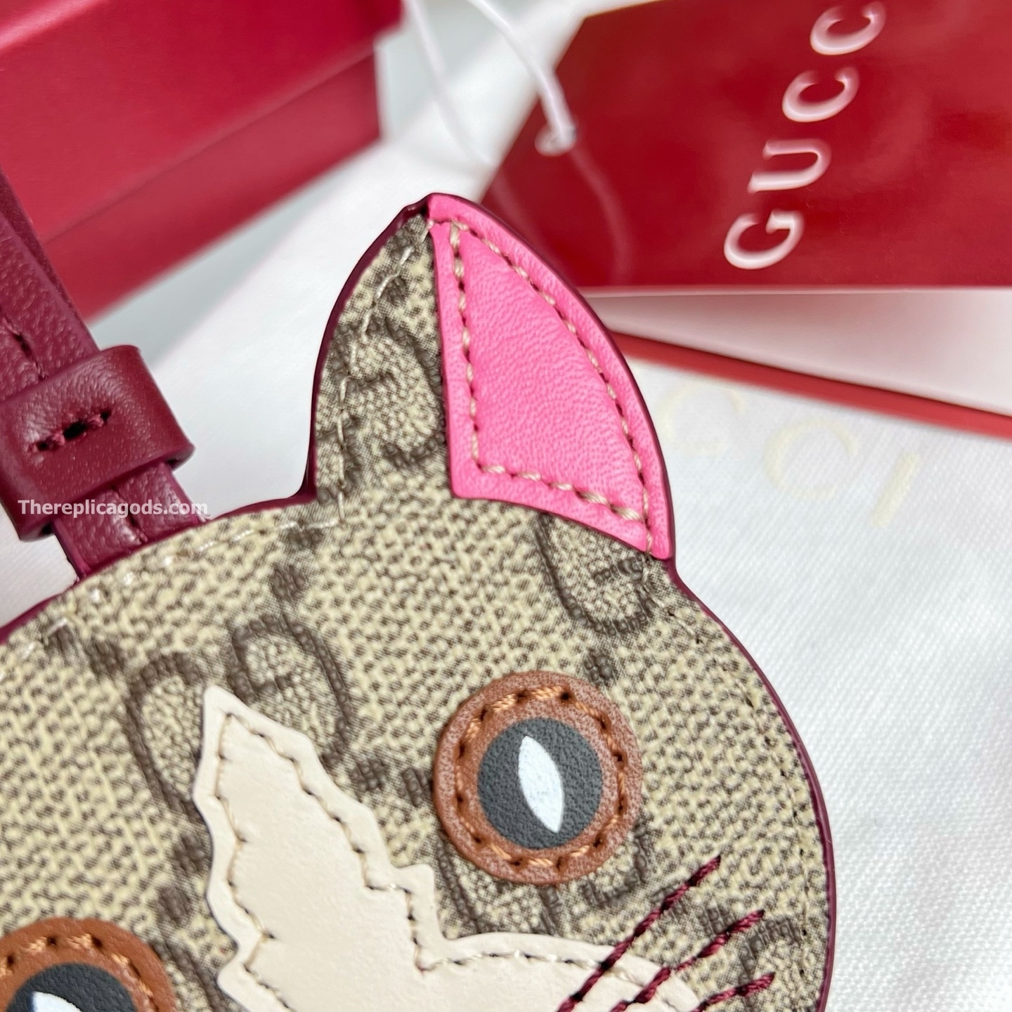 CAT-SHAPED BAG CHARM BEIGE AND DARK BROWN NEW GG MONOGRAM CANVAS