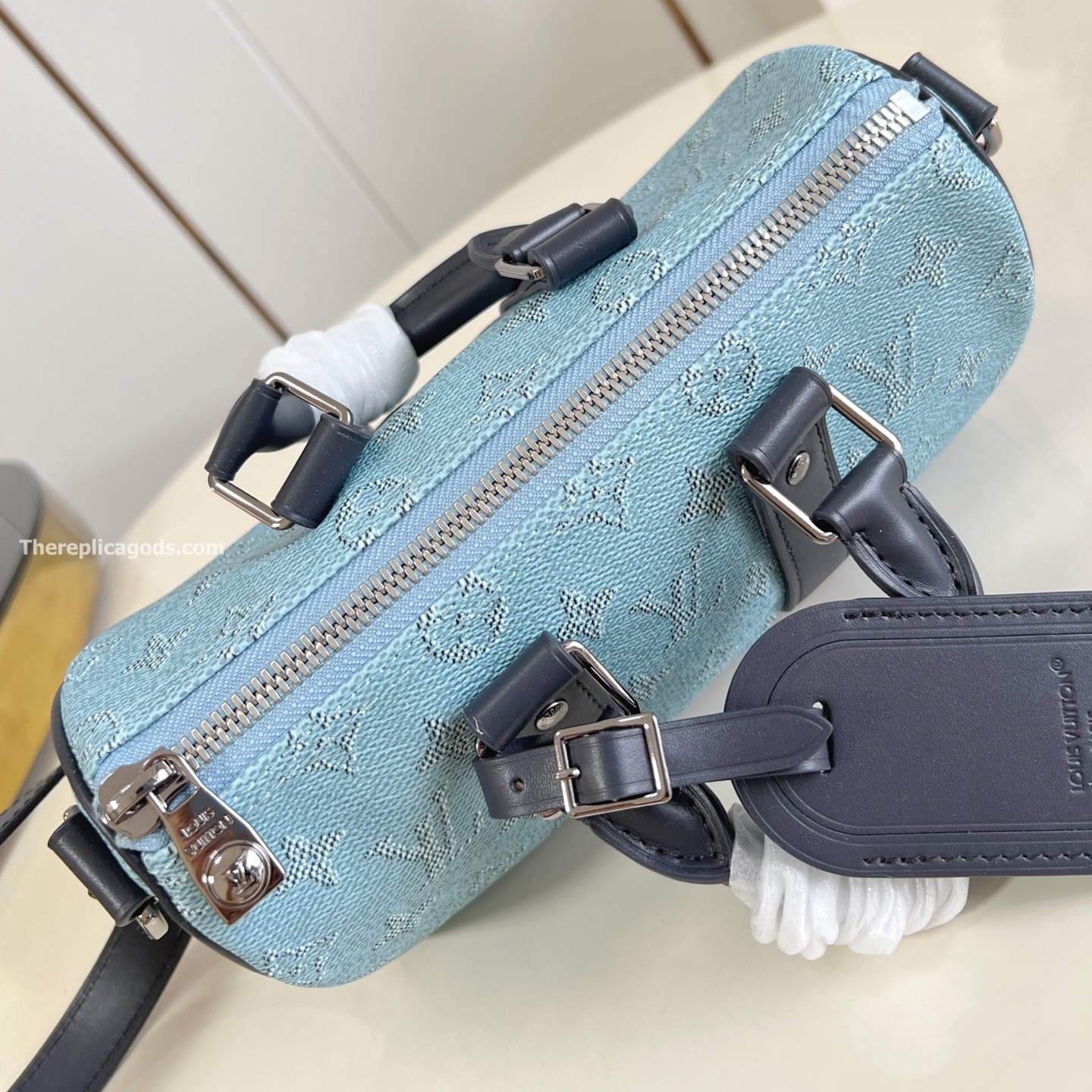 KEEPALL BANDOULIERE 25 BLUE MONOGRAM HERITAGE CANVAS M14681