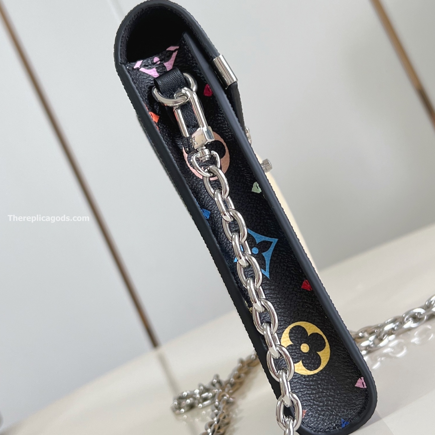 LV x TM PHONE POUCH METIS MULTICOLORED M14098