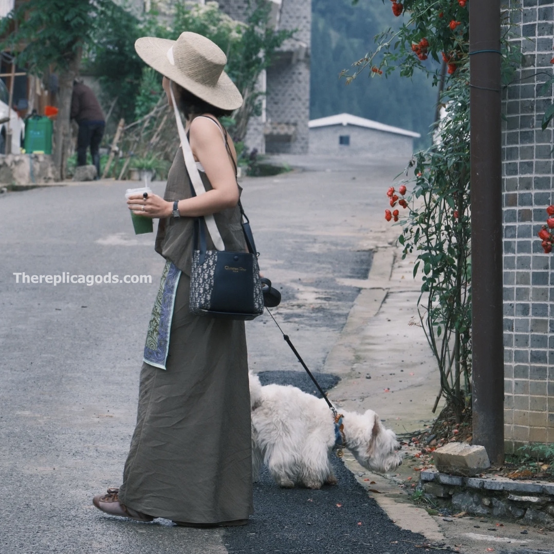 SMALL SIGNATURE BUCKET BAG BLUE OBLIQUE JACQUARD AND SMOOTH CALFSKIN