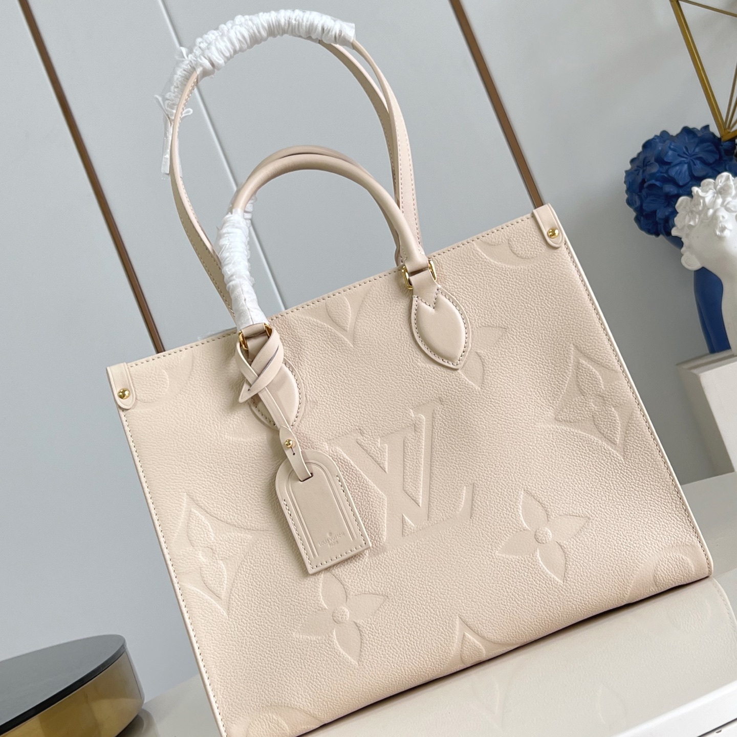 ONTHEGO MM BAG CREAM MONOGRAM EMPREINTE M46531